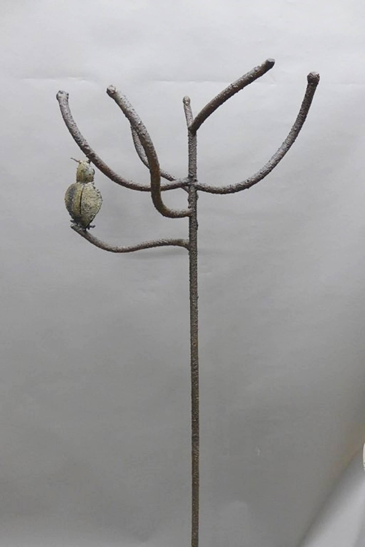 Stunning Mid-Century Modern coat hanger sculpture in the Brutalist style in the manner of Silas Seandel.
The piece is very whimsical and unique, there is an owl sculpture perching in one of the branches, the piece is tall and perfect to be used as