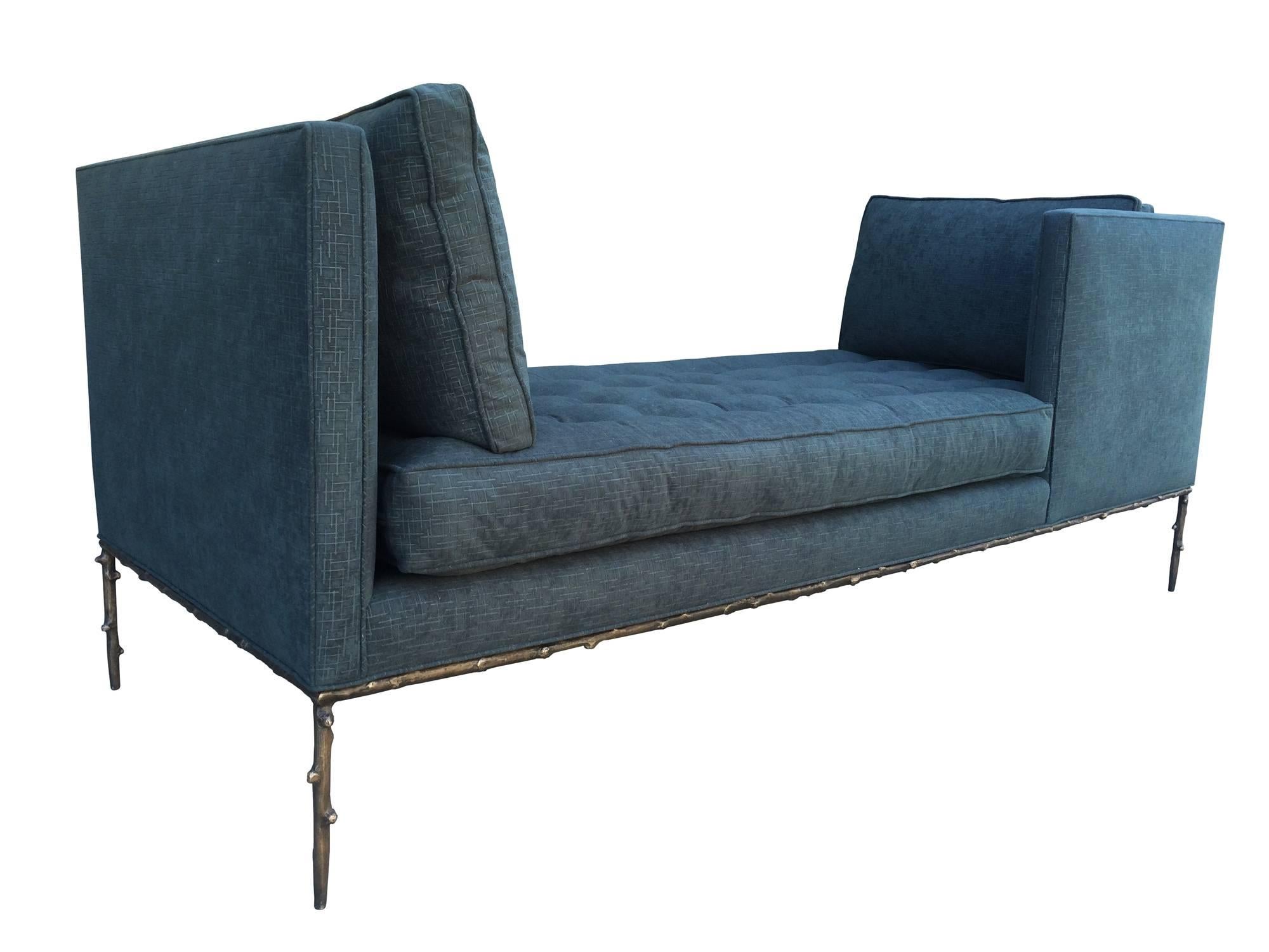 Stunning and beautiful Tête–à–tête daybed with solid bronze base designed and manufactured by Amparo Calderon Tapia for Cain Modern.

The piece is very comfortable, each side has a nice and plushed down filled cushion and the seat is a mixture