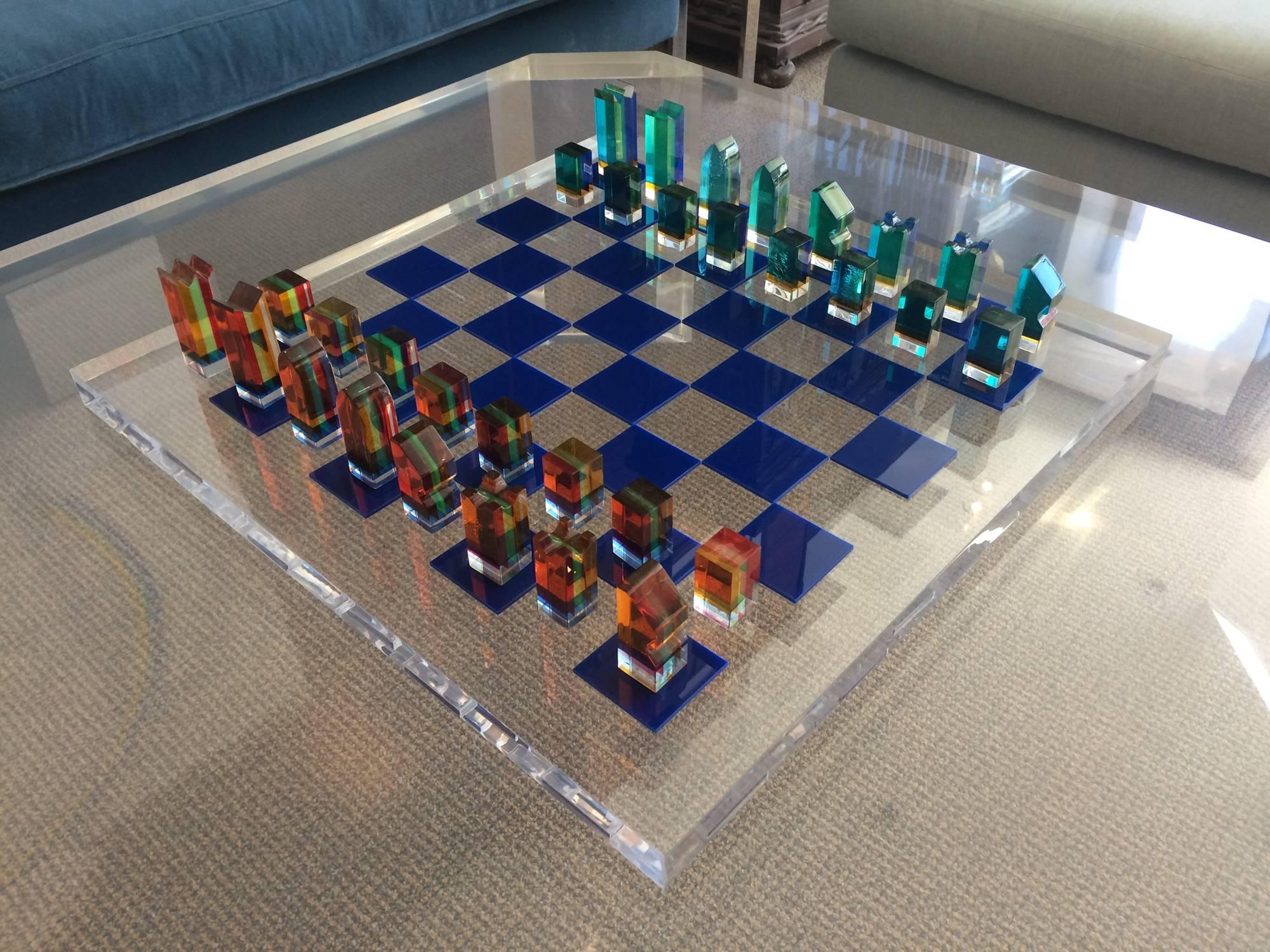 Stunning chess set designed by the Lucite master, Charles Hollis Jones.
The set is from the mid-1960s and is in very good original condition, the board has a few surface scratches and the pieces have a little crazing due to age and use.
There us