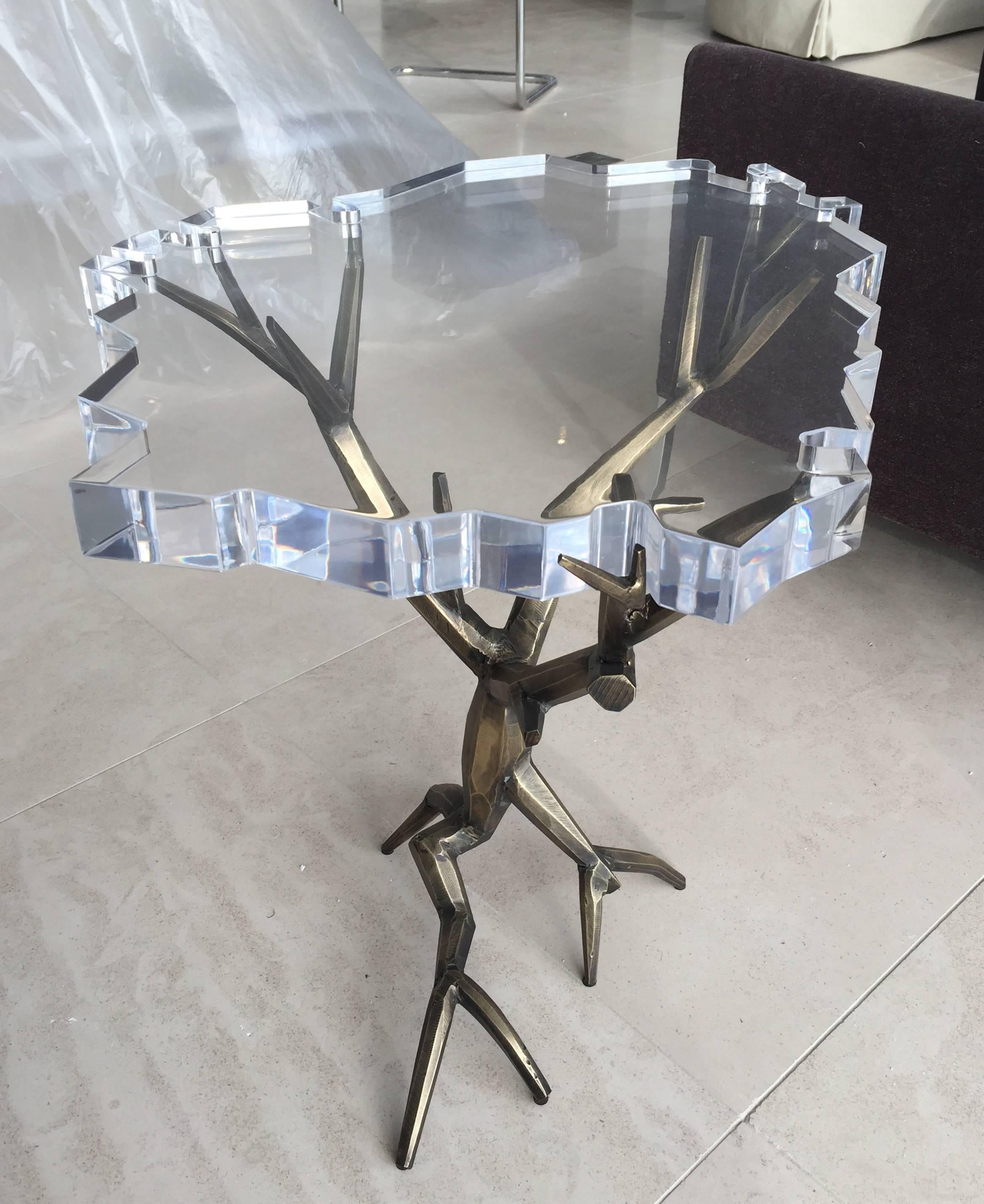 Beautiful side table made out of solid brass with a bronze finish is a one of a kind creation by designer Amparo Calderon Tapia designed exclusively for Cain Modern.
The piece is part of the series 