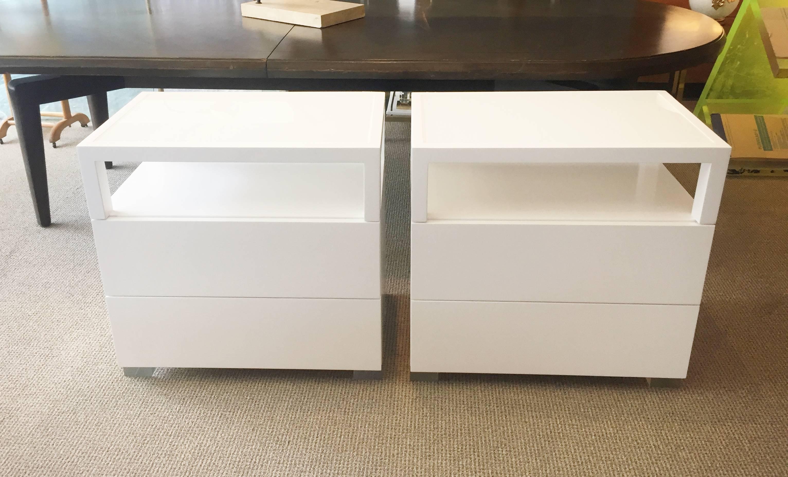 Beautiful pair of nightstands made of solid white oak and Lucite with a milk glass tops.

The pieces have beautiful lines and great presence, they are solidly built and crafted locally.

The nightstands come with two drawers for storage and it
