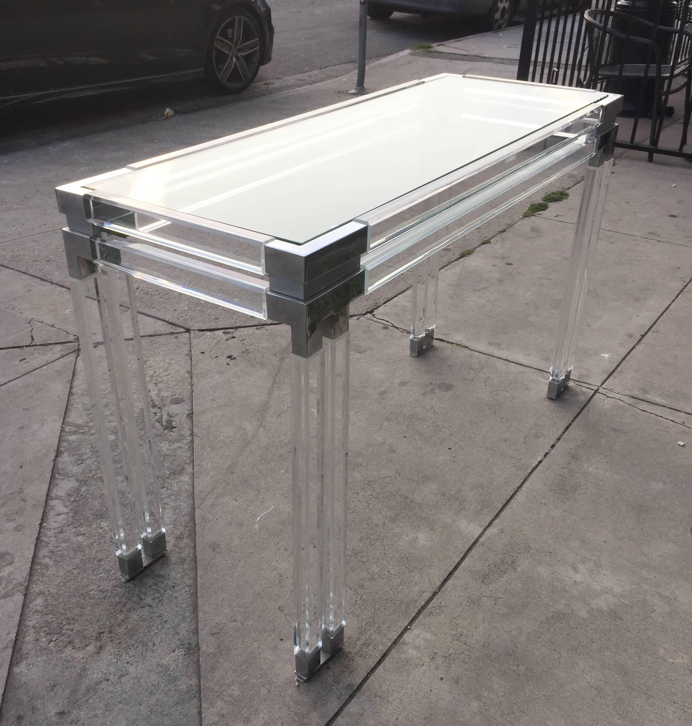 polished nickel console table