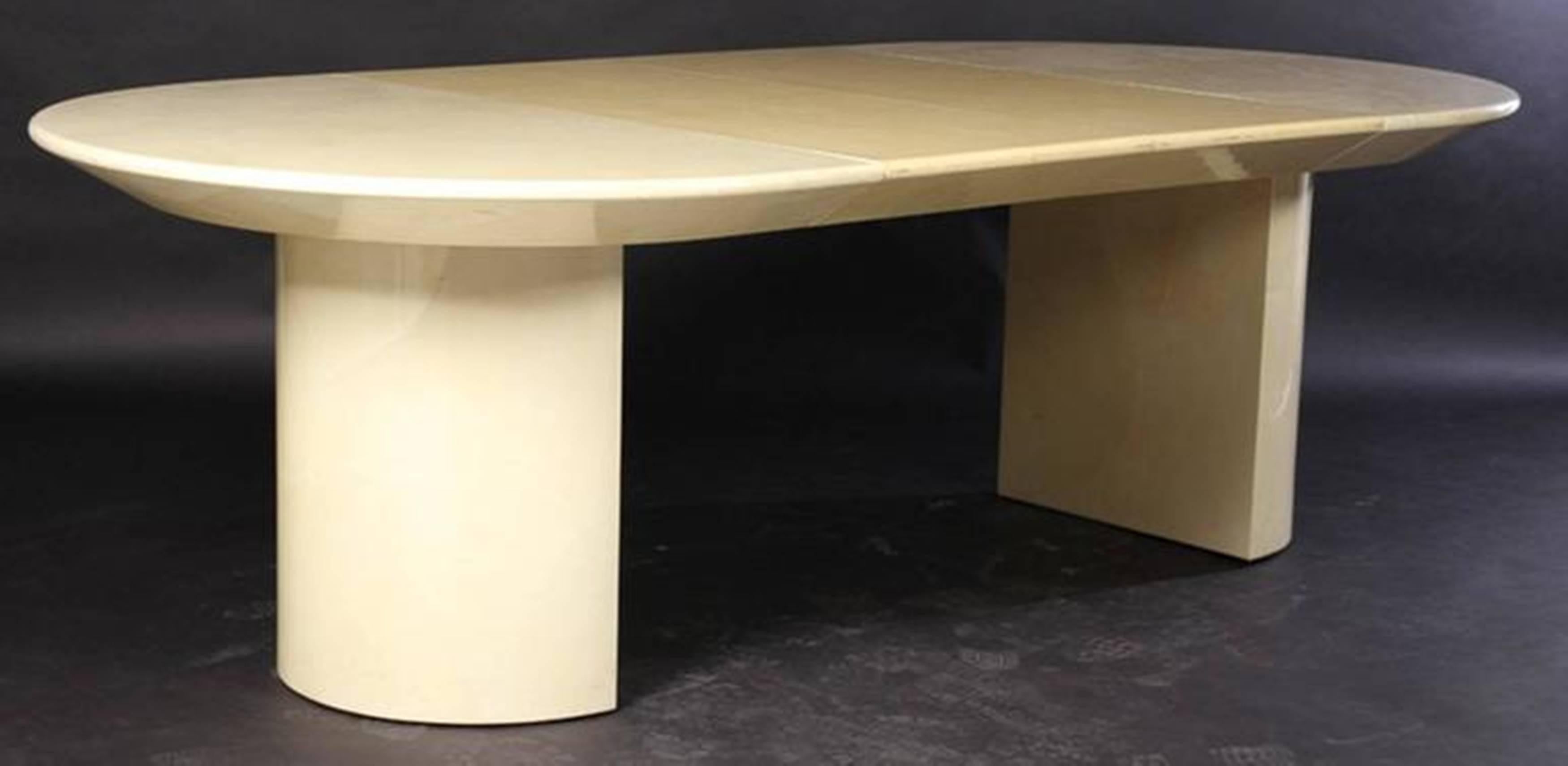 Double pedestal base, beveled underside, the table comes with two leaves that are 20