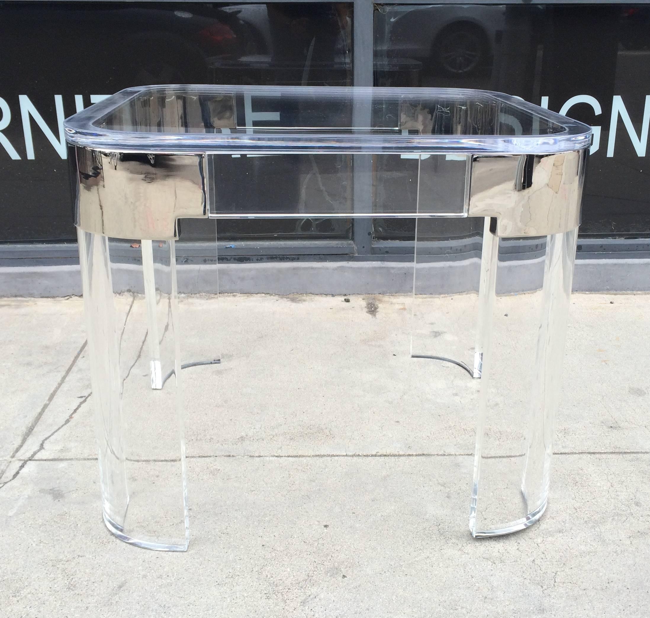 Vintage pair of Lucite and polished nickel side tables from the 