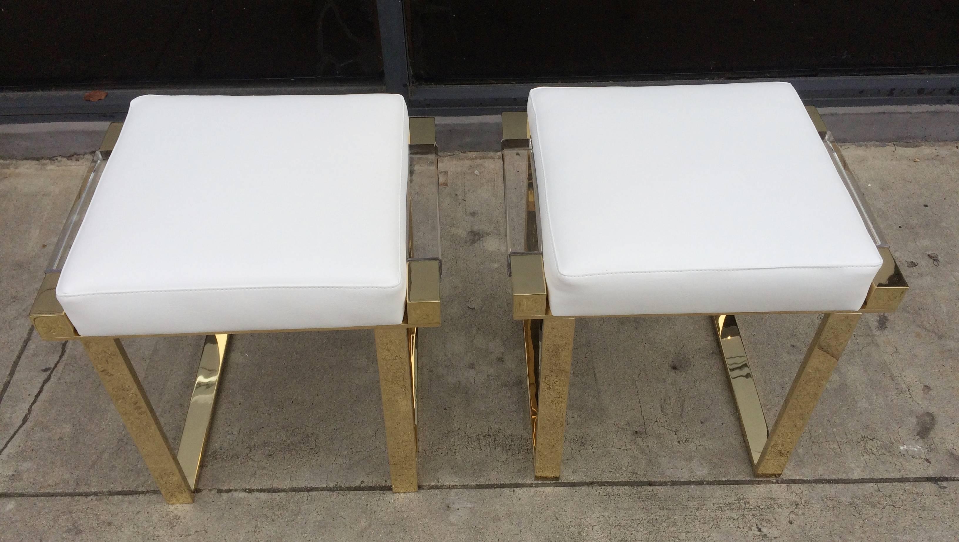 Amazing pair of Lucite and brass benches designed and manufactured by Charles Hollis Jones as part of his 