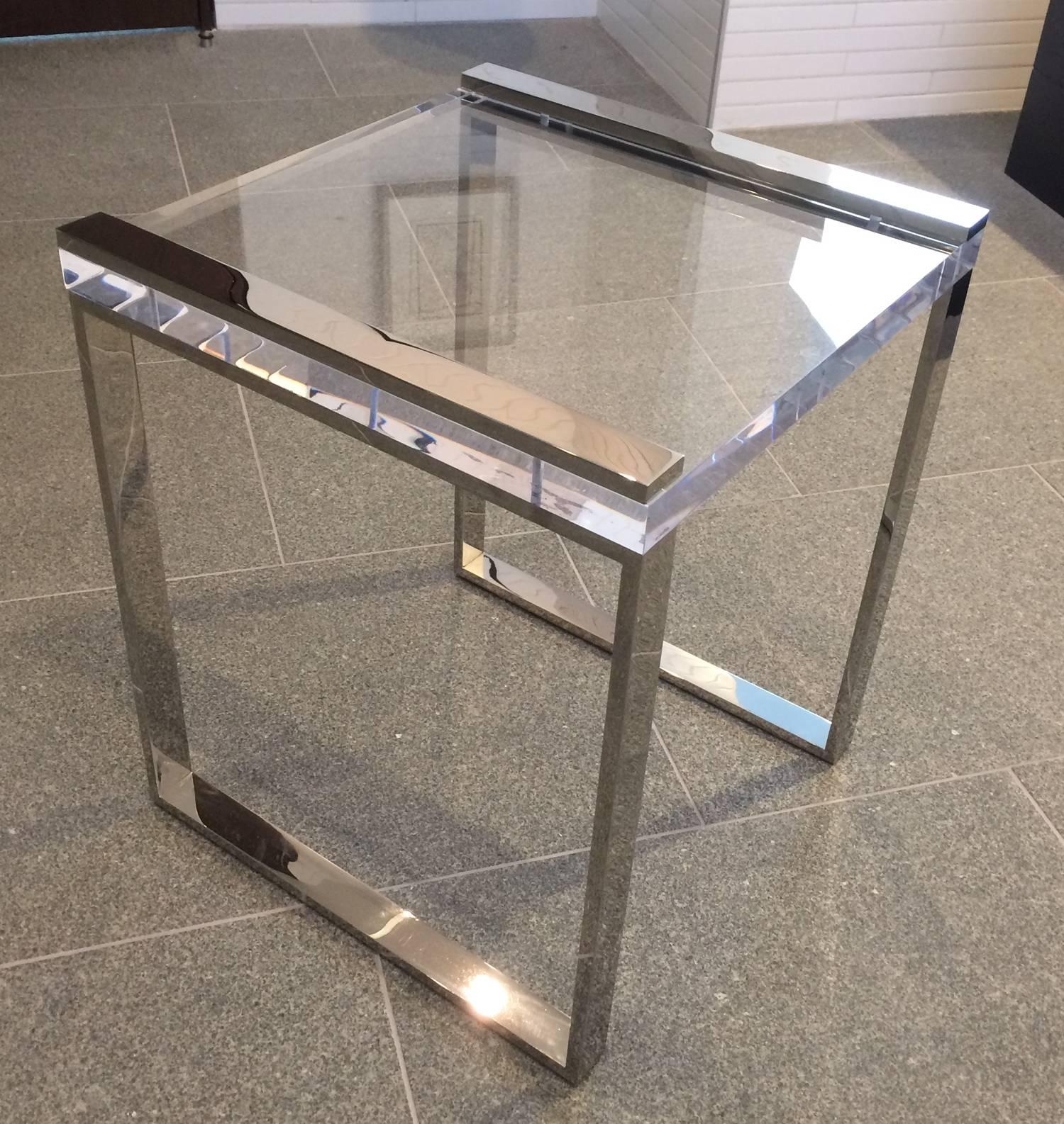 Stunning pair of Lucite and polished nickel side or end tables designed and manufactured by Charles Hollis Jones as part of his 