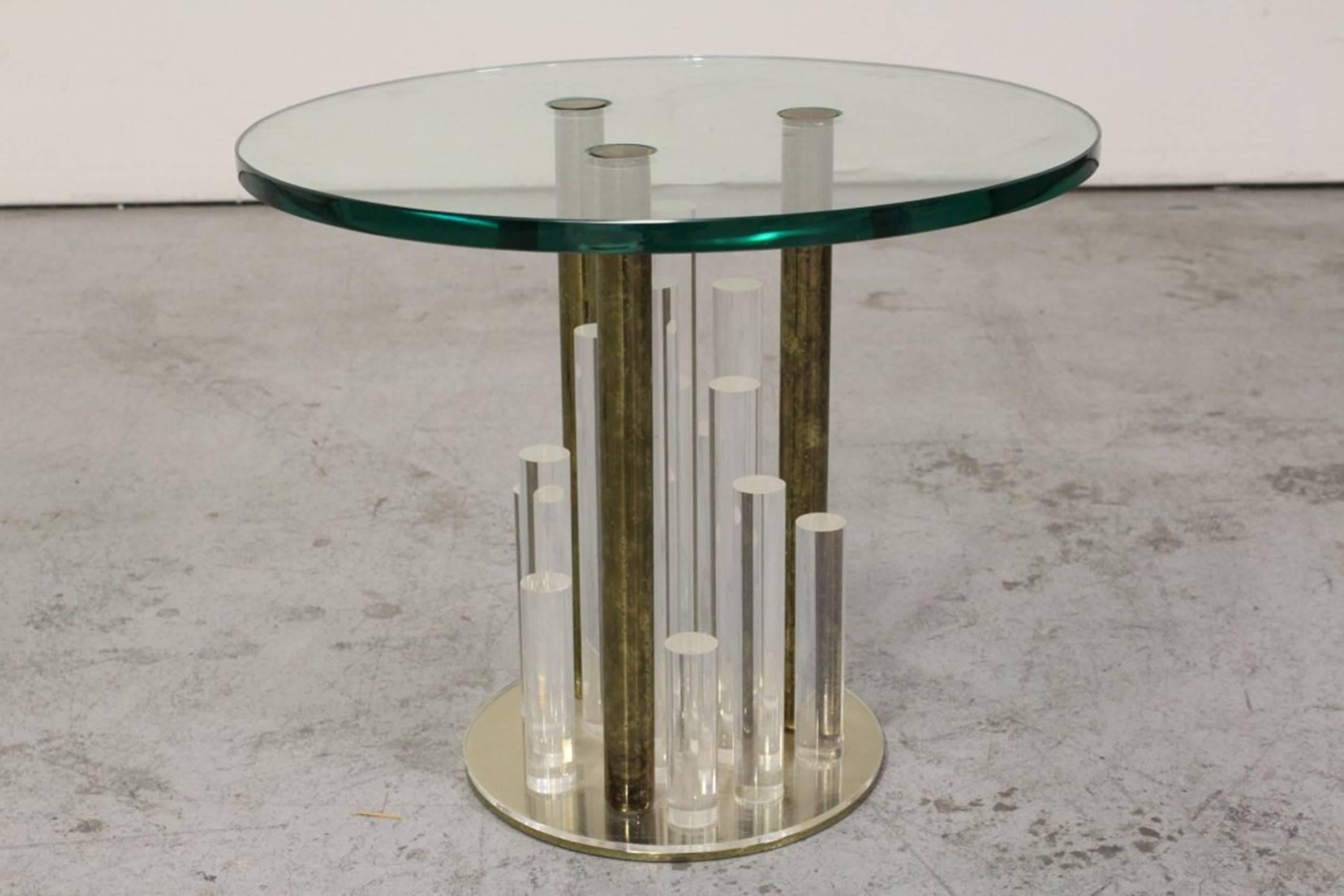 Beautiful set of side tables in Lucite and brass designed and manufactured by Charles Hollis Jones in the early 1970s.
These 