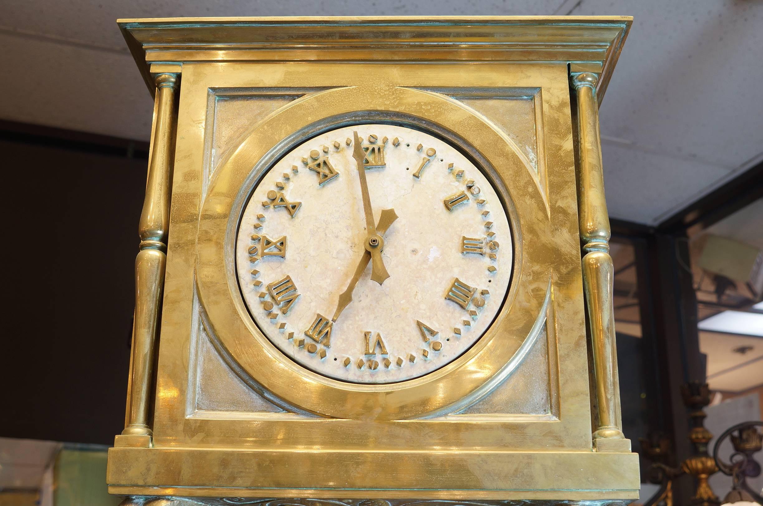Important Art Deco Period Tall Bronze Clock with Four Time Zones In Good Condition For Sale In New York, NY