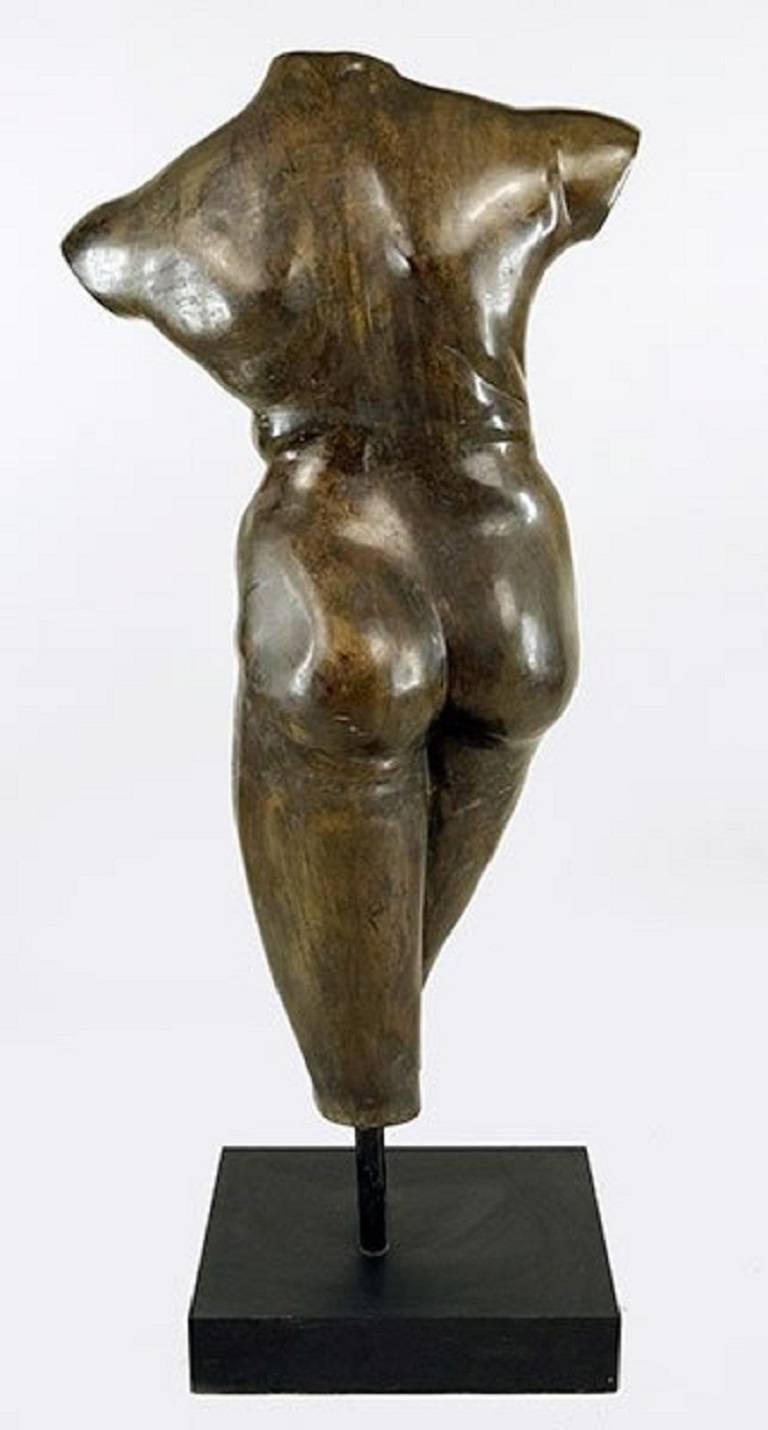 A set of two patinated bronze torso sculptures of a nude man and a nude woman mounted on black laminated bases, unsigned.
Stock Number: SC112