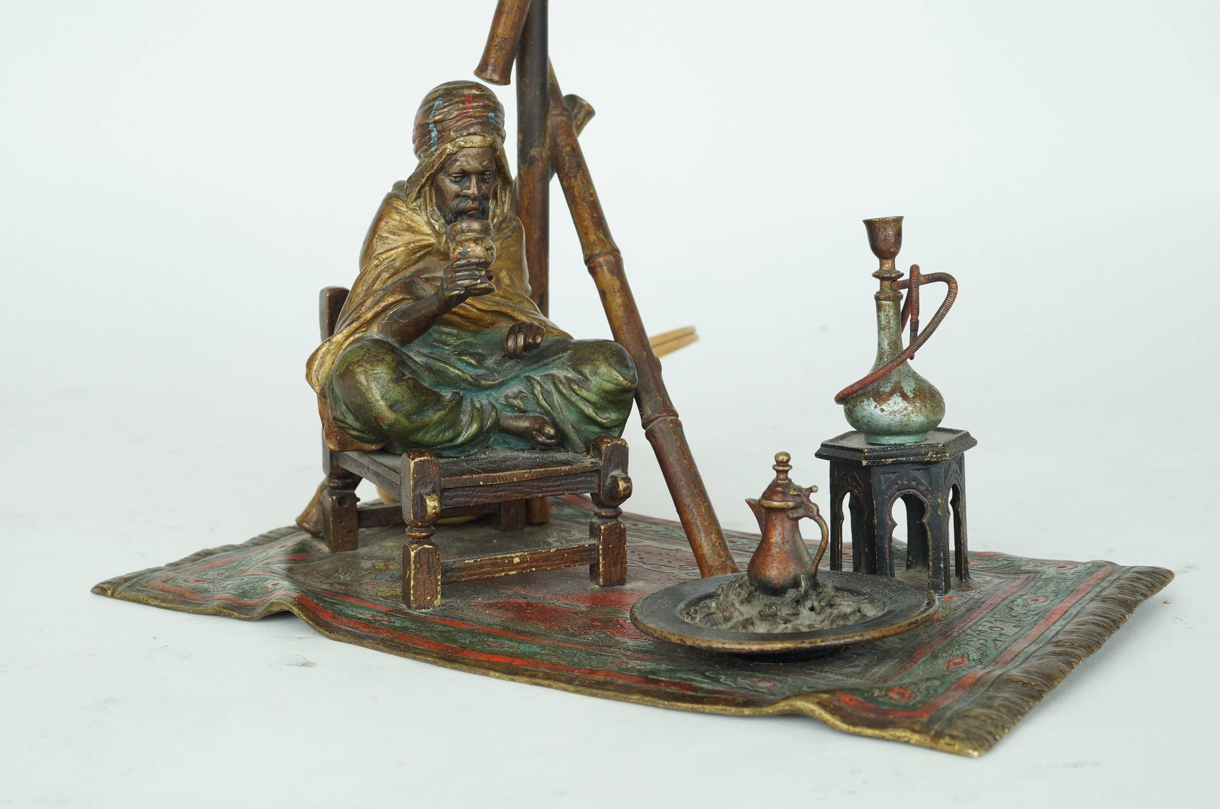 Cold-Painted Bronze Bergman Lamp of a Seated Man on Chair Having Coffee For Sale