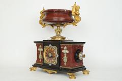 Three-Piece Rouge Marble, Bronze and Champleve Enamel Clock Ganiture Set