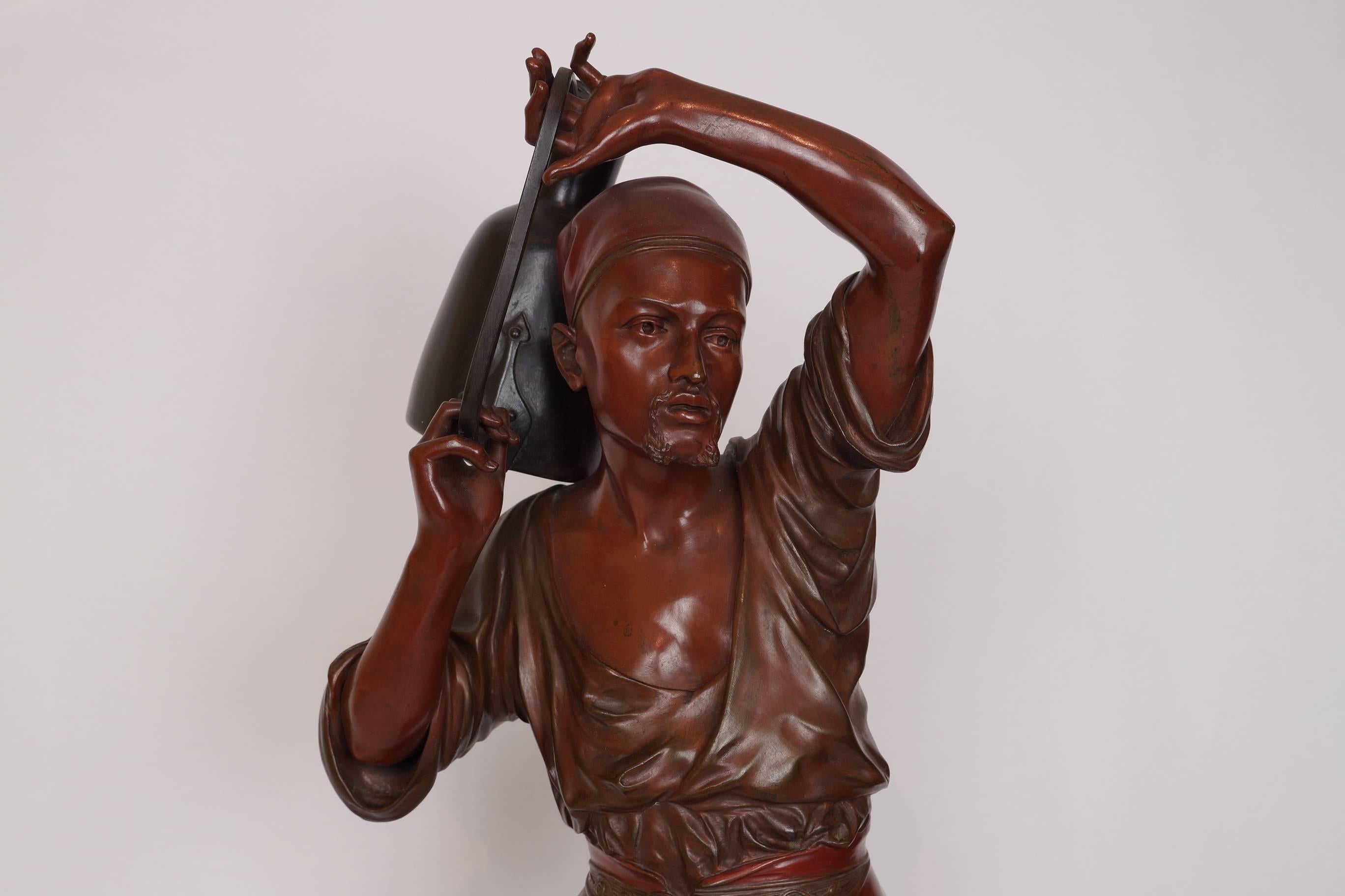 Patinated Bronze Orientalist Figure of a Water Carrier Signed Holin In Excellent Condition In New York, NY