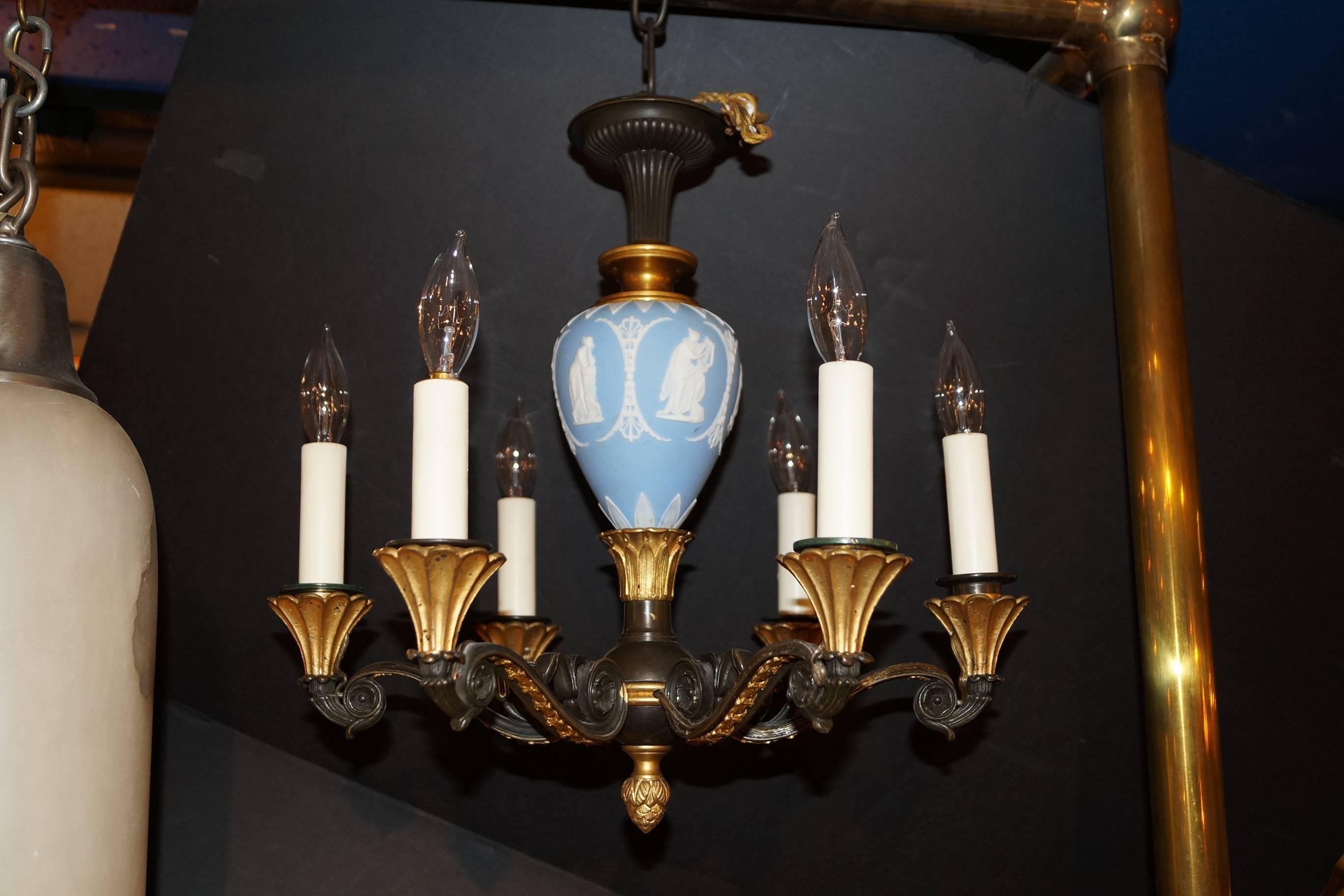 Fine pair of blue Wedgwood and bronze six-arm chandeliers with patinated bronze and gilt decorations of great quality
Stock number: L394
