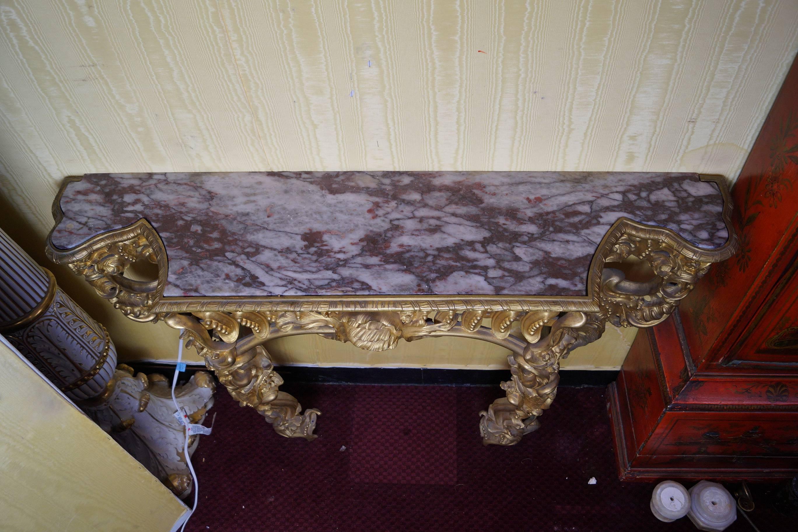 French gilt bronze marble-top console table of very fine casting with great details.
Stock number: F73.