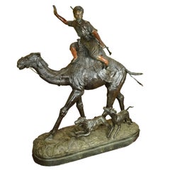 Massive Patinated Bronze Figure of an a Hunter on Camel with Dogs after P J Mene