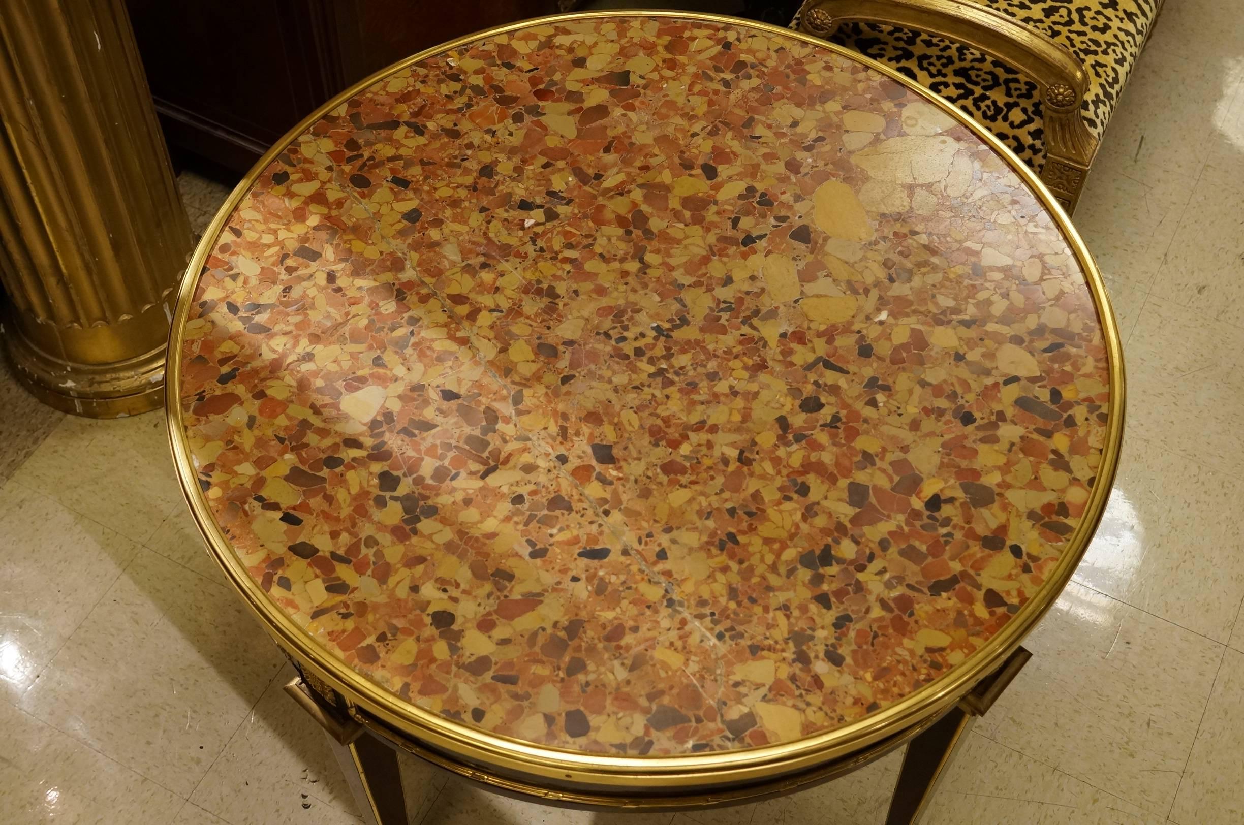 Antique French Louis XVI style round marble-top center table with gilt bronze mounts.

Stock number: F117.