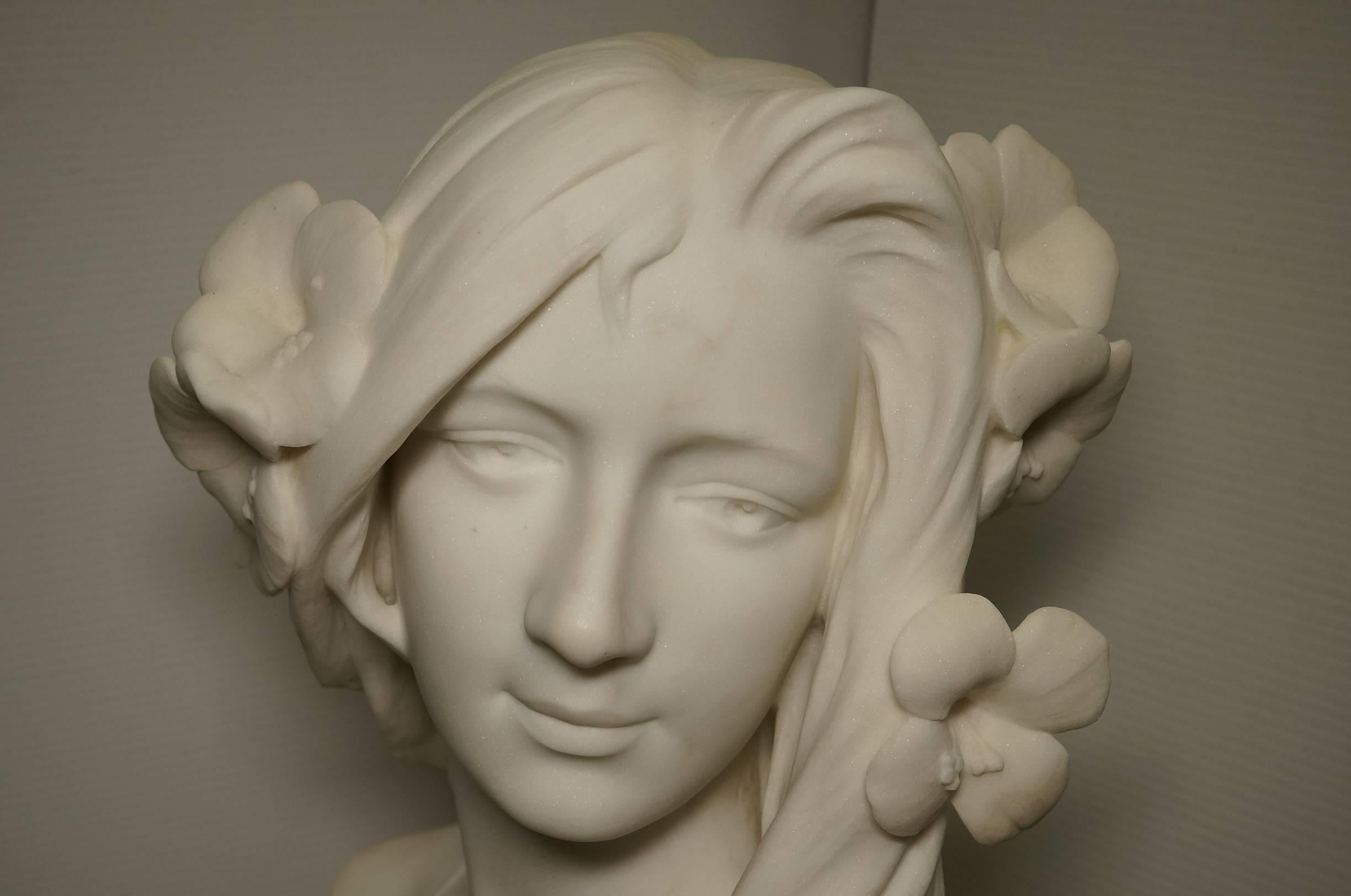 carved woman marble bust