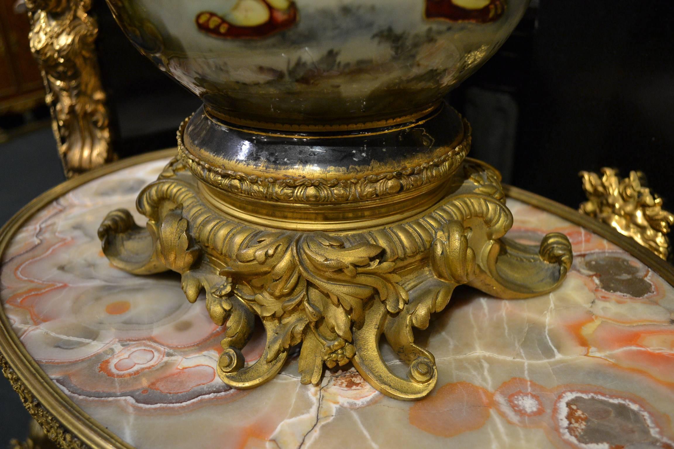 Large enameled on porcelain and bronze footed vase with standing chevalier scene. Finely raised enamel work.
