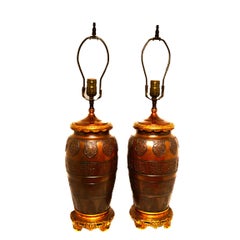 Pair of Patinated and Gilt Bronze Lamps Attributed to Caldwell & Co