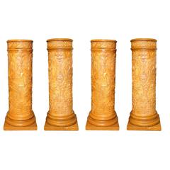 Set of Four Neoclassical Gilt Gesso Pedestals with Figural Motif