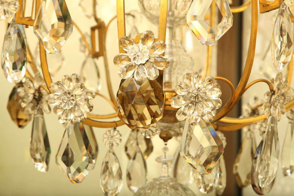 French Large Twelve Light Crystal and Bronze Chandelier Attributed to Bagues For Sale