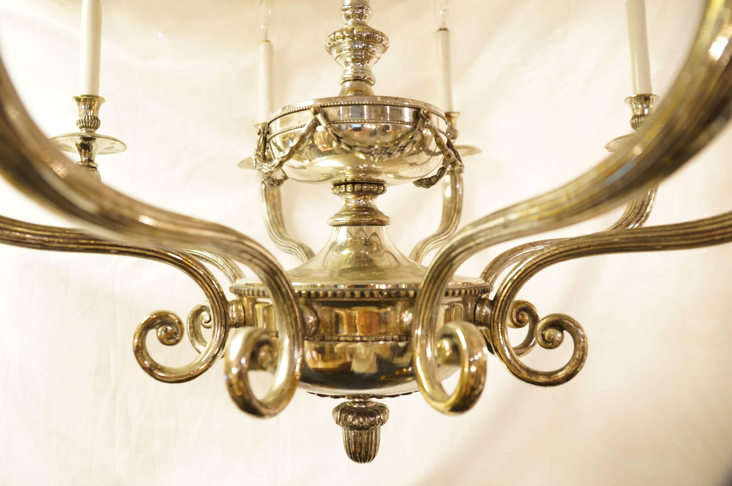 Neoclassical Eight-Arm Silvered Chandelier Attributed to Caldwell and Co.  In Excellent Condition For Sale In New York, NY