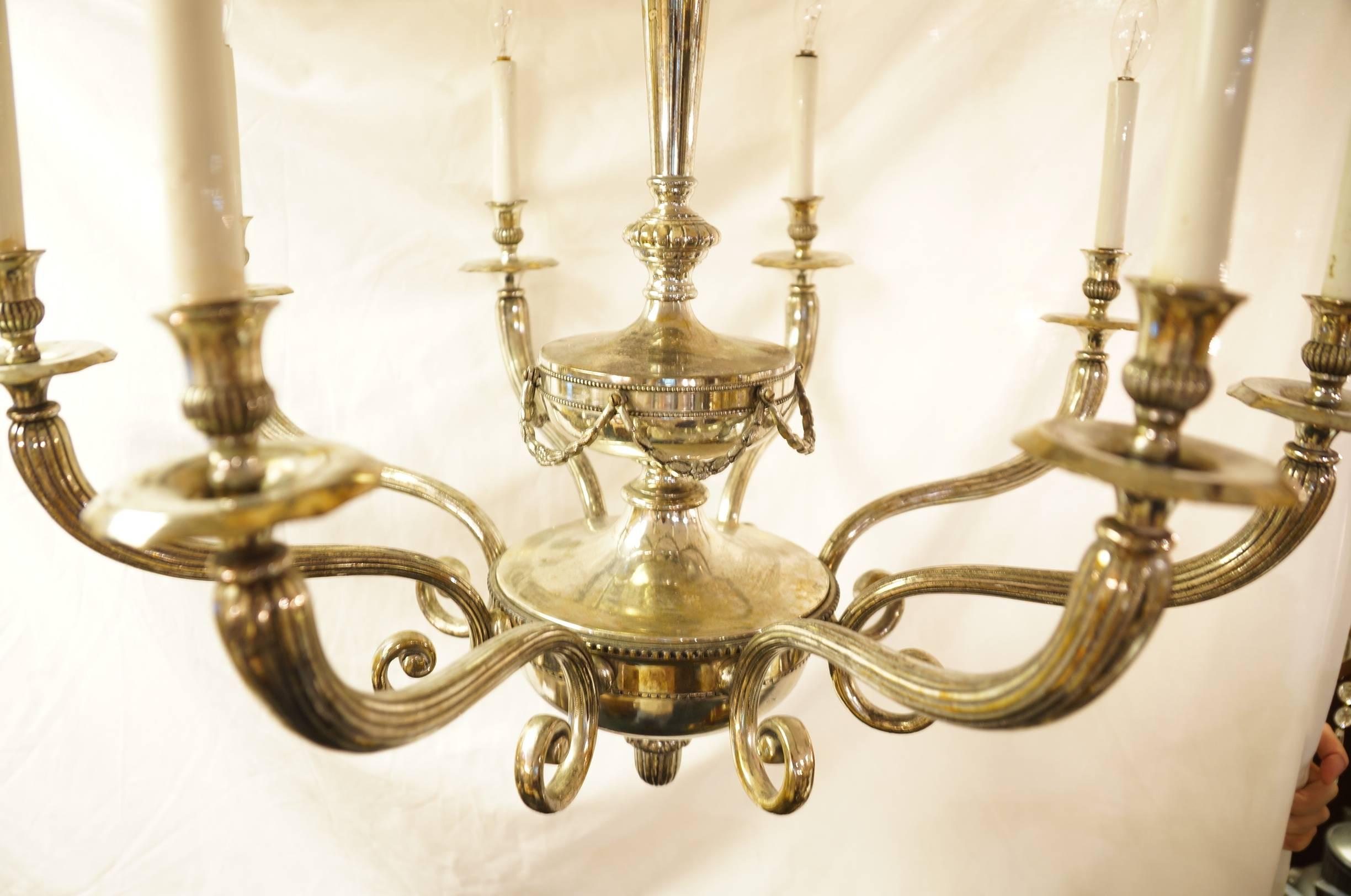 A Fine Neoclassical 8 Arm Silvered Chandelier Attributed to Caldwell and Co. 
Stock Number: L373