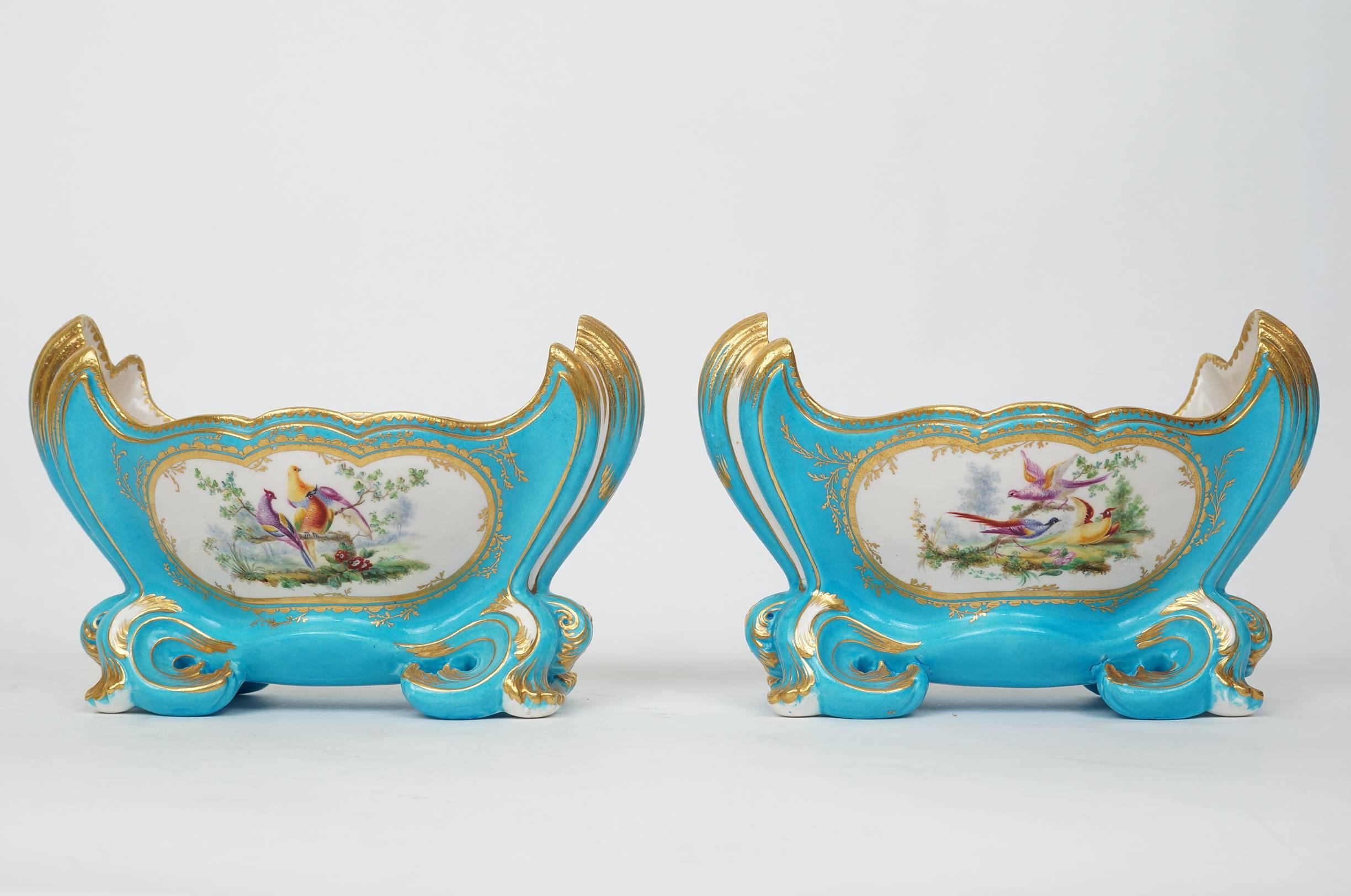 Pair of Celeste Light Blue Porcelain Cache Pots with Painted Bird Scenes
Stock Number: DA100