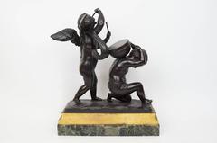Fantastic Patinated and Gilt Bronze Figural Group of Cherubs Playing Drums
