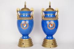 Pair of Neoclassical Painted Blue Porcelain Lamp Bases with Chariots Scenes
