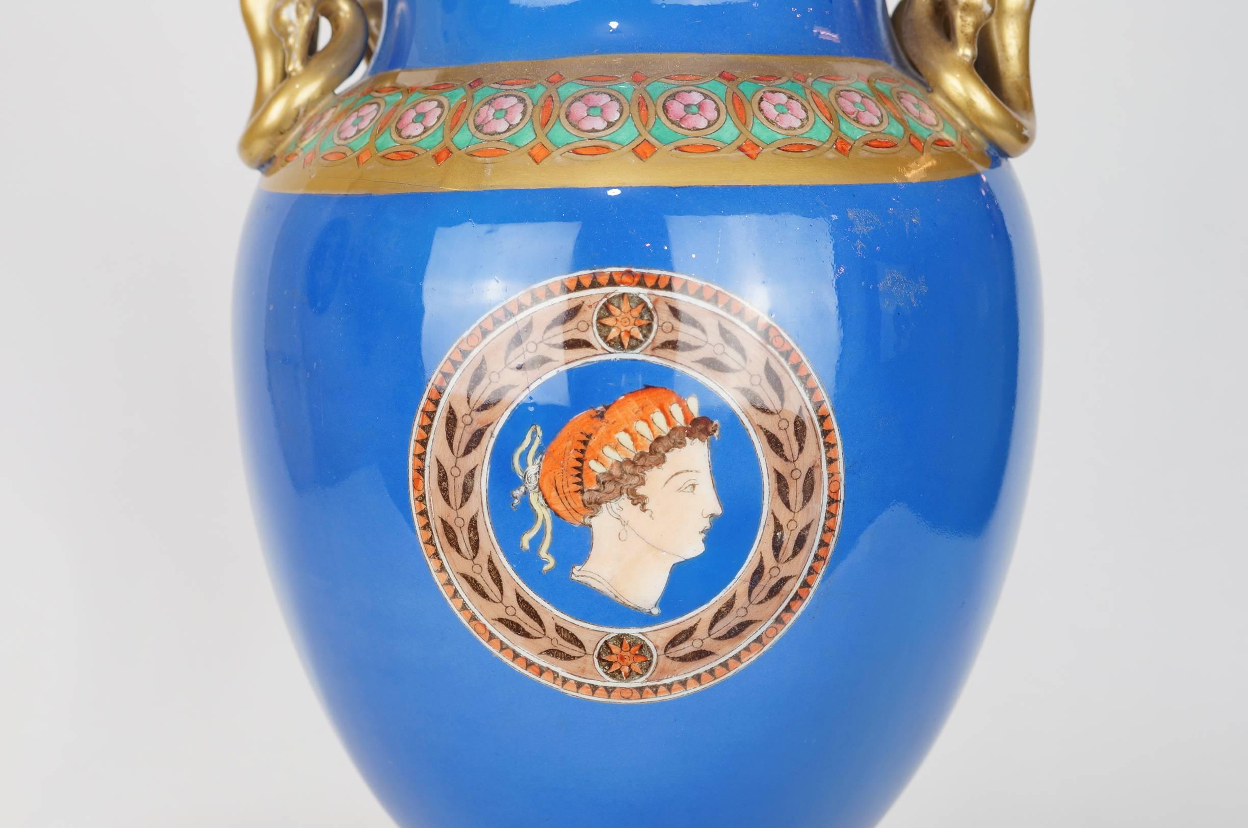 Pair of Neoclassical Painted Blue Porcelain Lamp Bases with Chariots Scenes In Fair Condition In New York, NY