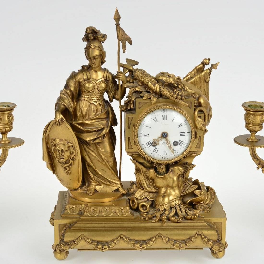 French Napoleon III Gilt Bronze Figural Three-Piece Clock Garniture In Excellent Condition In New York, NY
