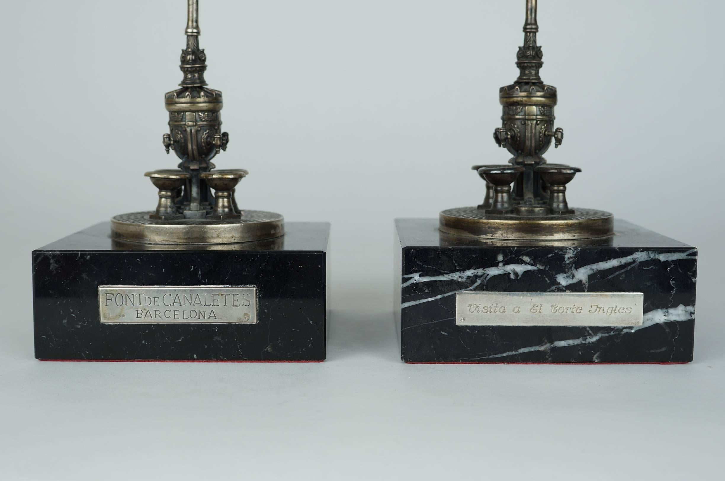 Pair of Silver Miniature form Floor Torcheres on Marble Base
Possibly made after an architectural street torcheres in Barcelona
Marked 925
Stock Number: DA200