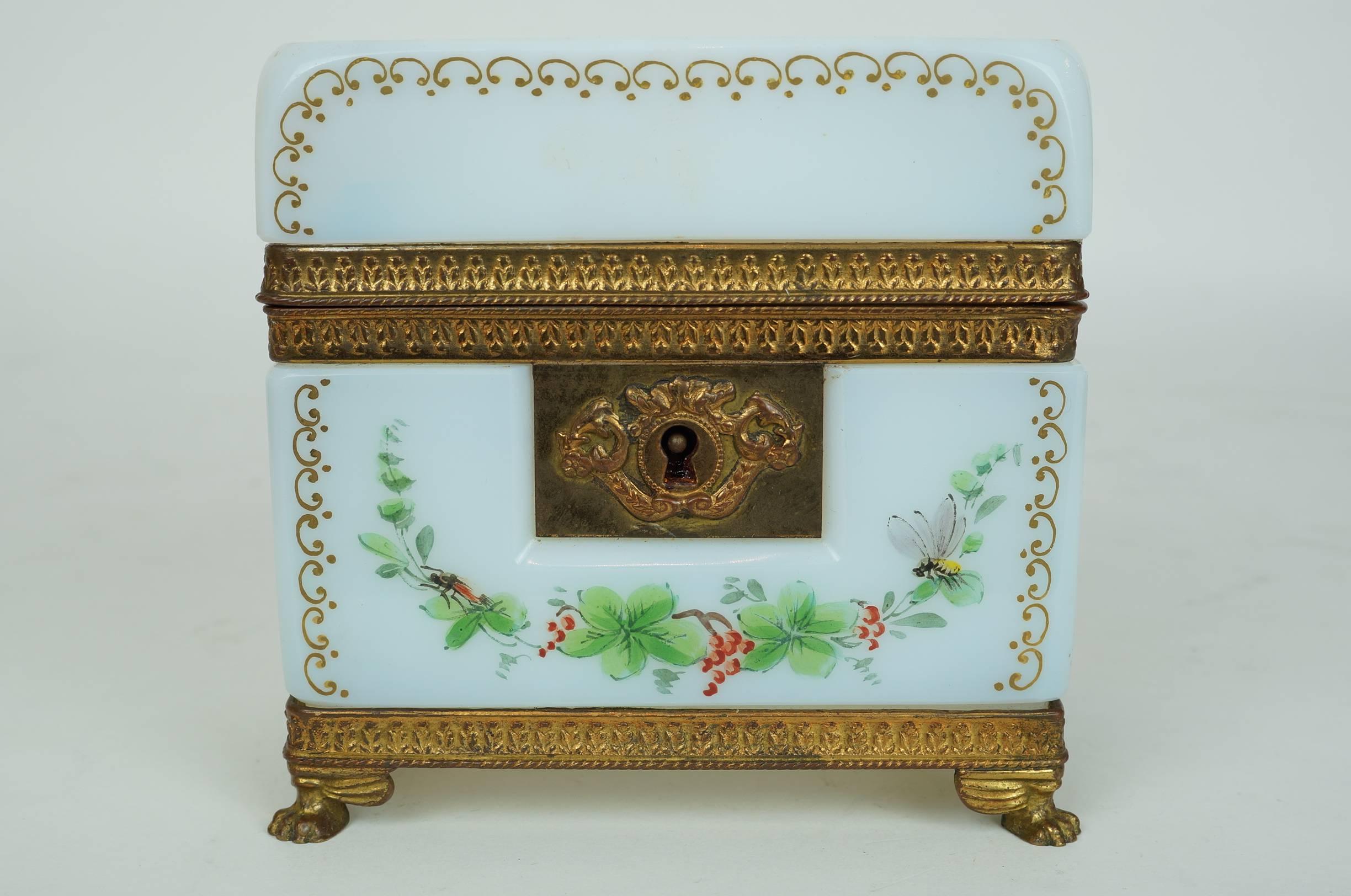 A French White Opaline Jewelry Box with Painted Floral and Bird Decorations
Stock Number: DA136