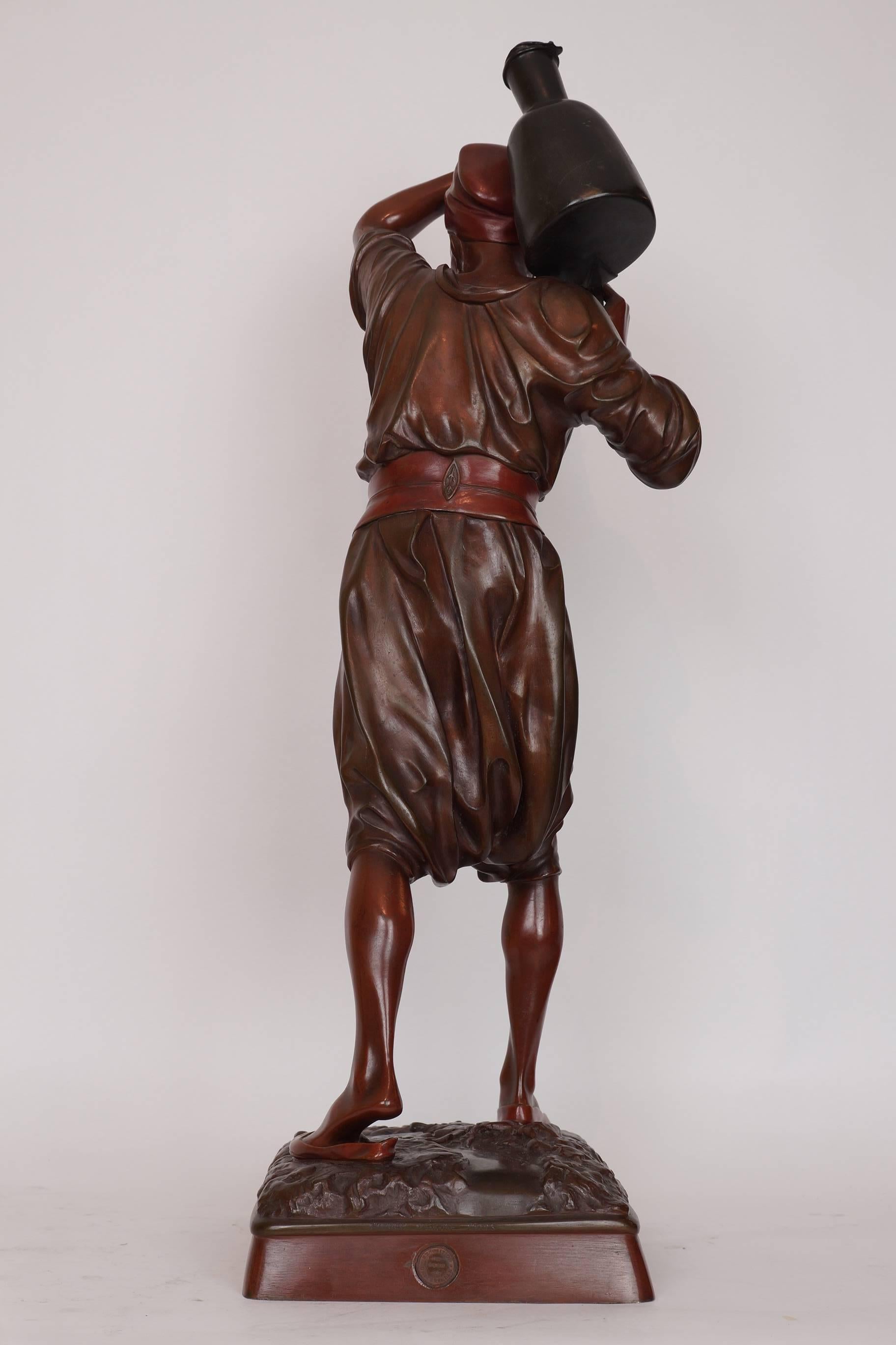 Orientalist patinated bronze figure of a water carrier signed: Hiolin.
Louis Auguste Hiolin.
Stock Number: SC107