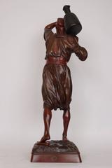 Patinated Bronze Orientalist Figure of a Water Carrier Signed Holin