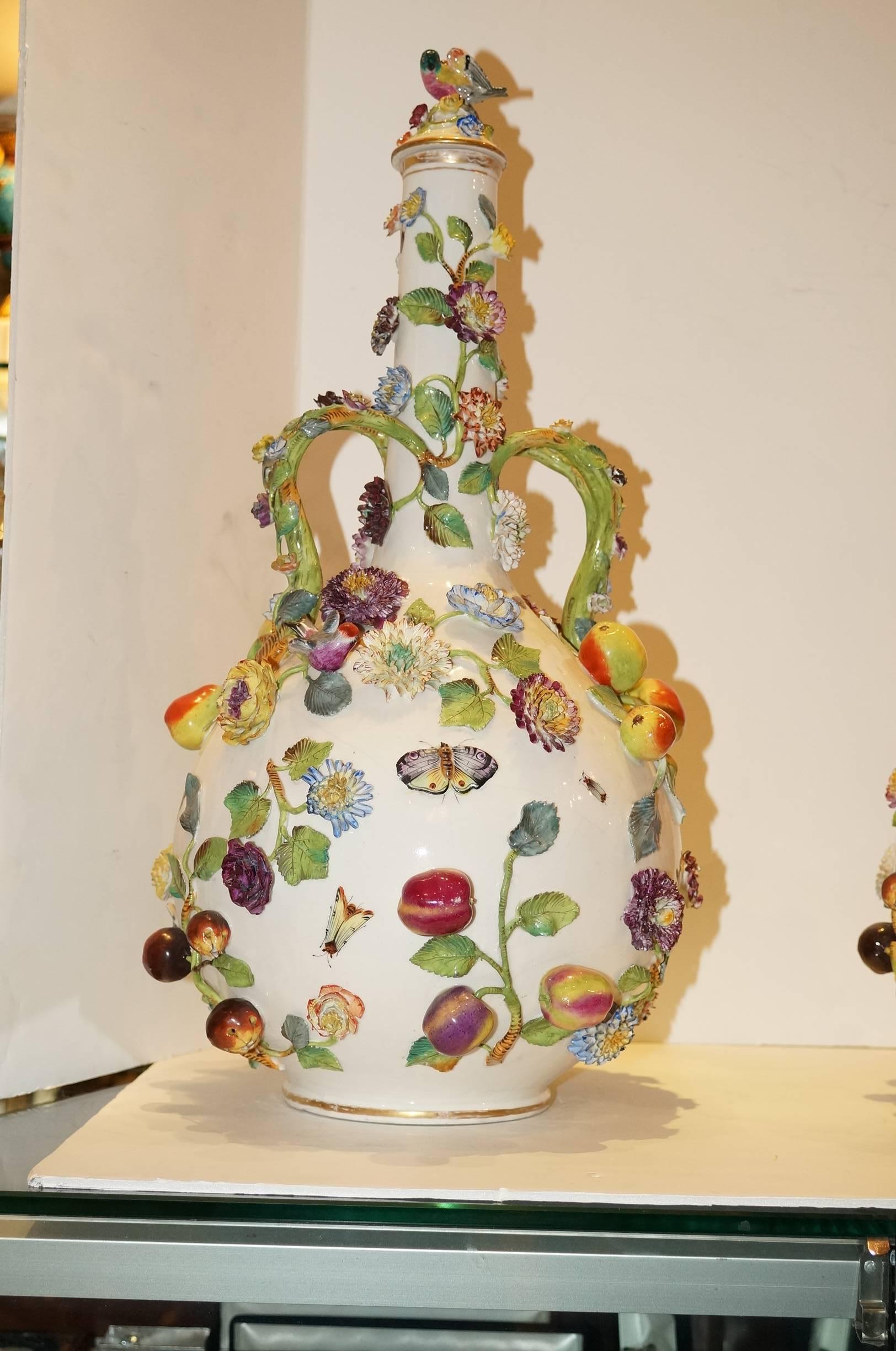 Pair of Continental Porcelain Bottle Form Vases with applied Fruits and Flowers In Good Condition In New York, NY