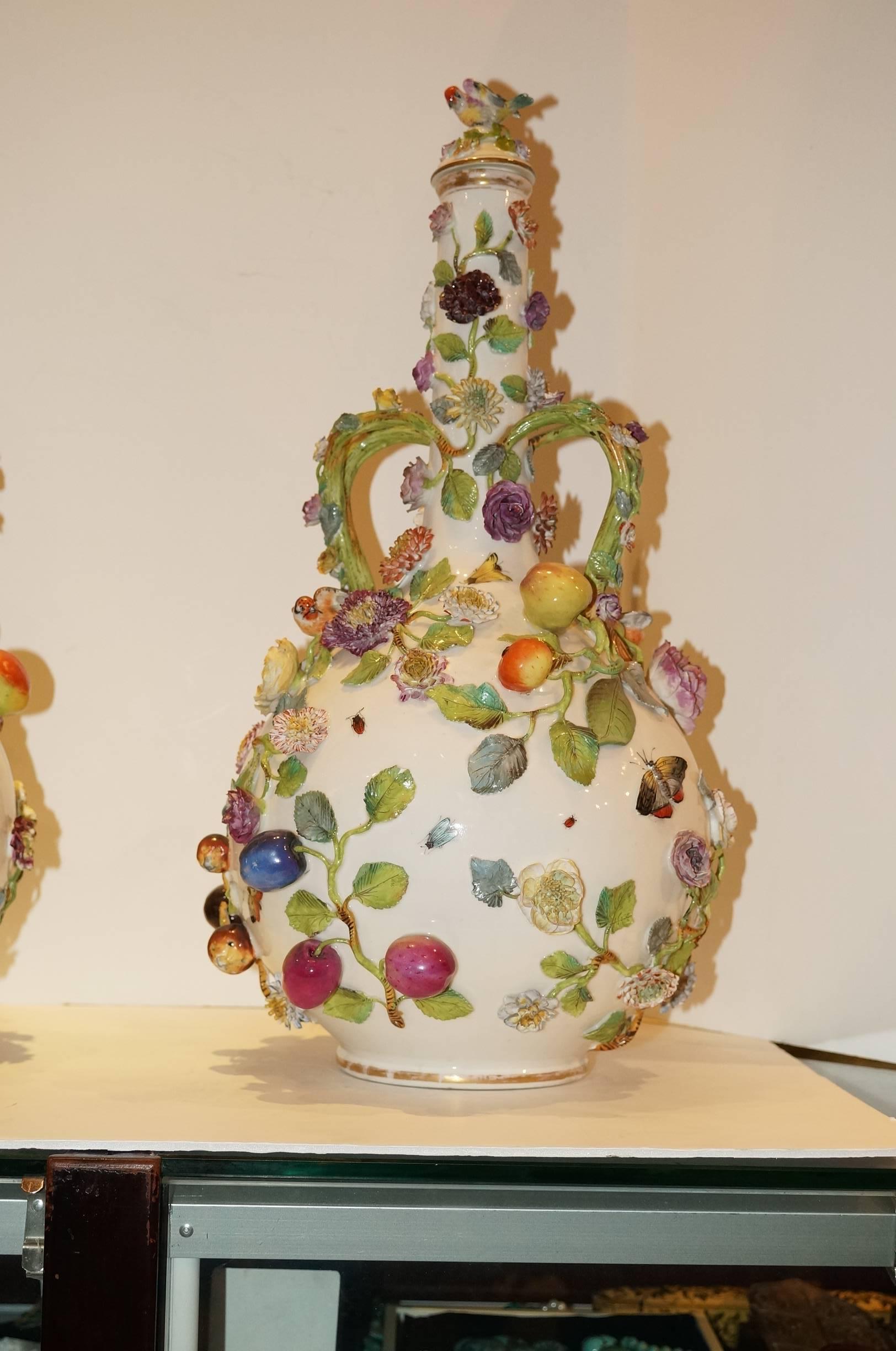 19th Century Pair of Continental Porcelain Bottle Form Vases with applied Fruits and Flowers