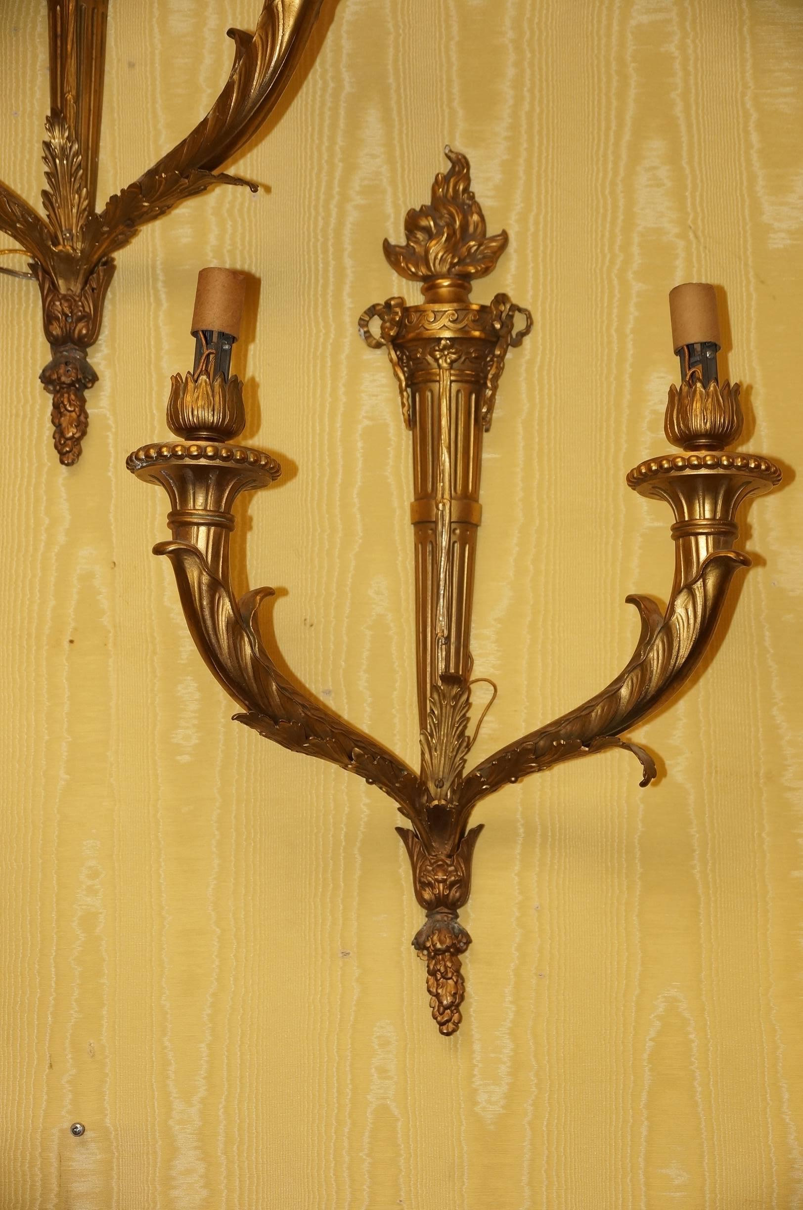 Gilt Louis XV Style Torch Form Two-Light Sconces For Sale
