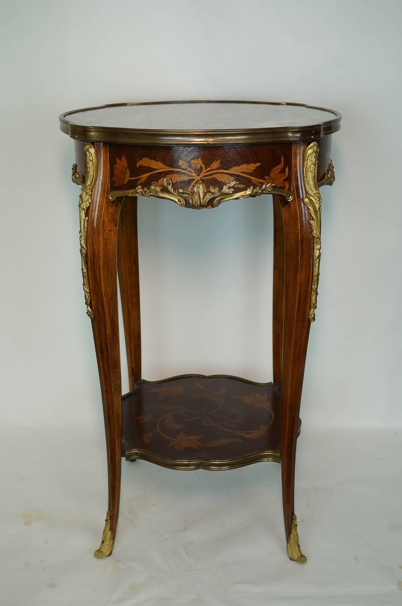 Wonderful pair of 19 century  French  Louis XV style bronze mounted   Marquetry Inlaid Side Tables with marble top.