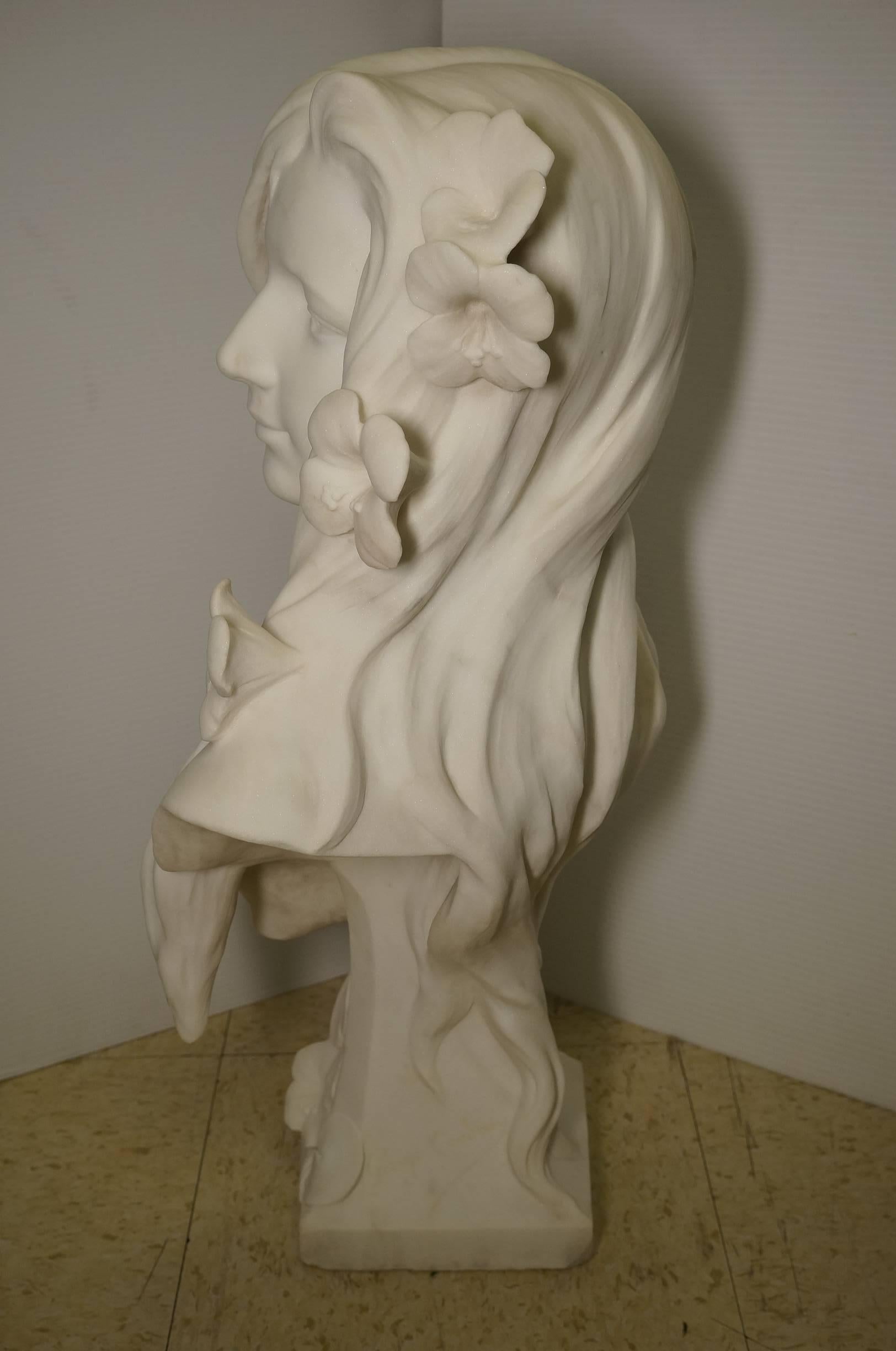 Fantastic Art Nouveau hand-carved Italian white marble bust of a woman.
Signed.