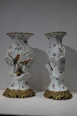 Pair of Aesthetic Painted Porcelain and Bronze Covered Urns with Bird and Flower