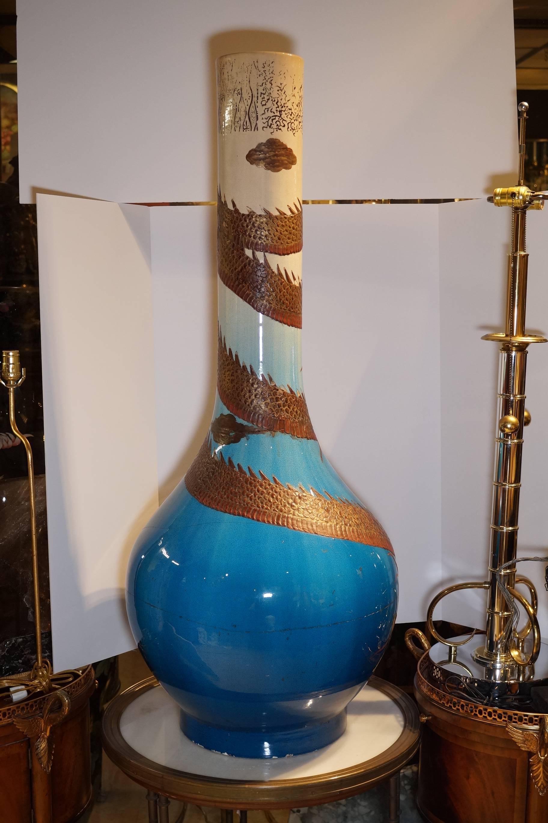 Large Japanese Satsuma vase with lacquered dragon decoration.