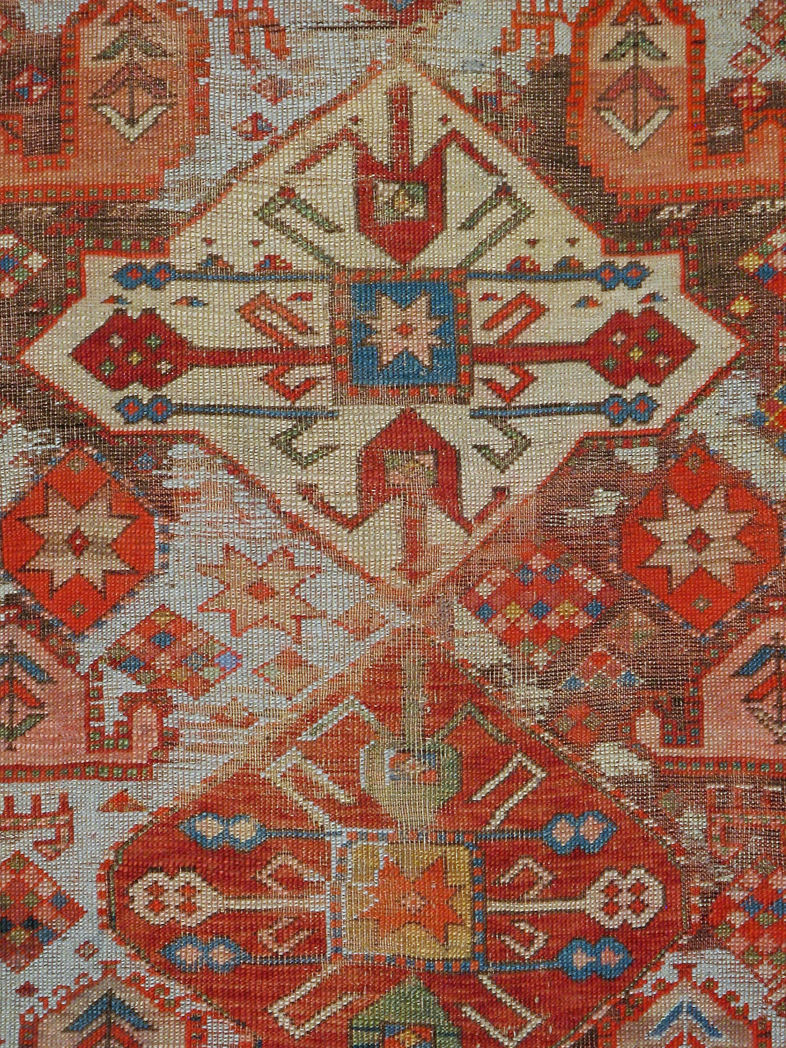 An antique Russian Kazak carpet from the first quarter of the 20th century.