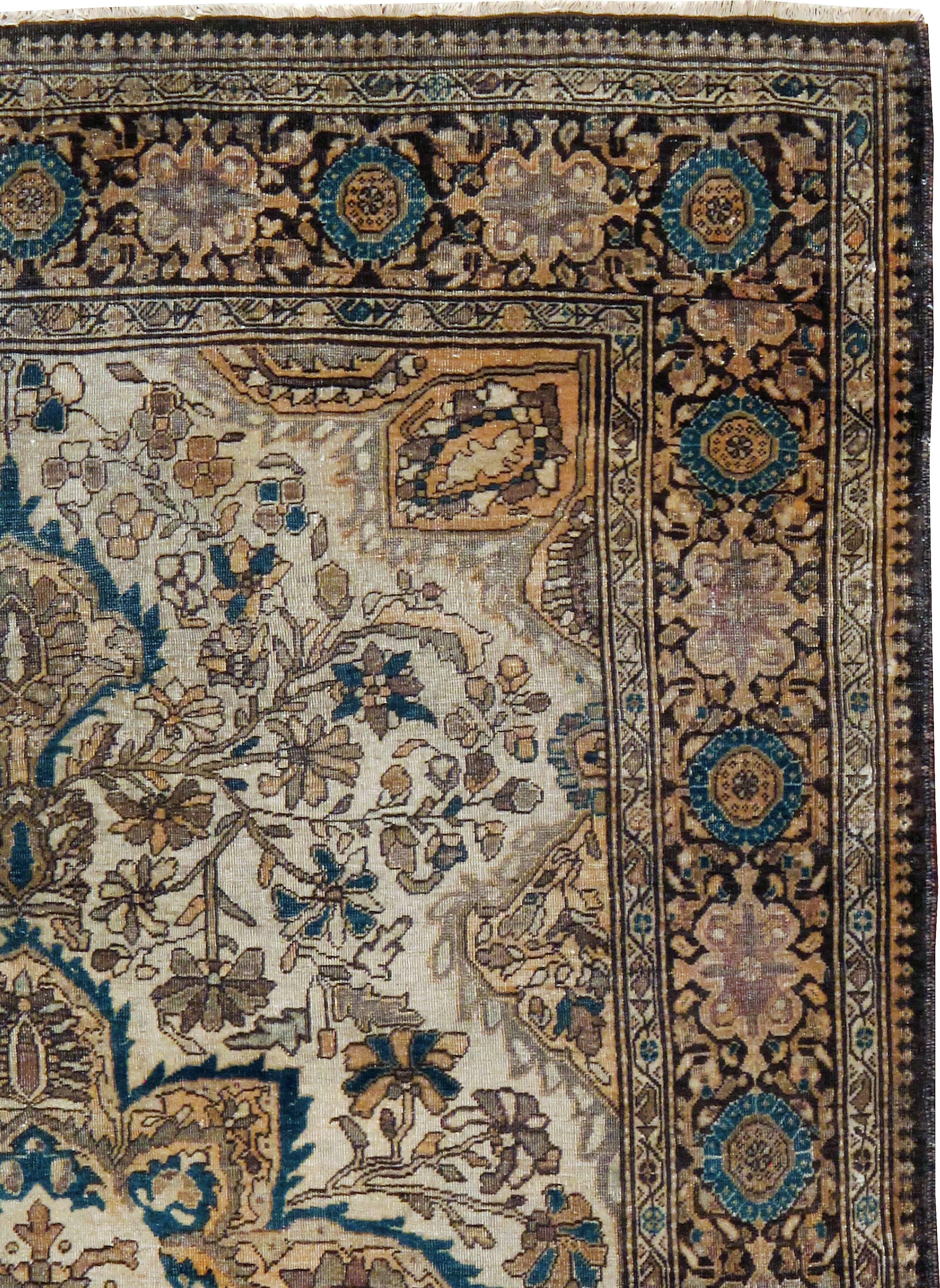An antique Persian Sarouk Farahan carpet from the mid-20th century.