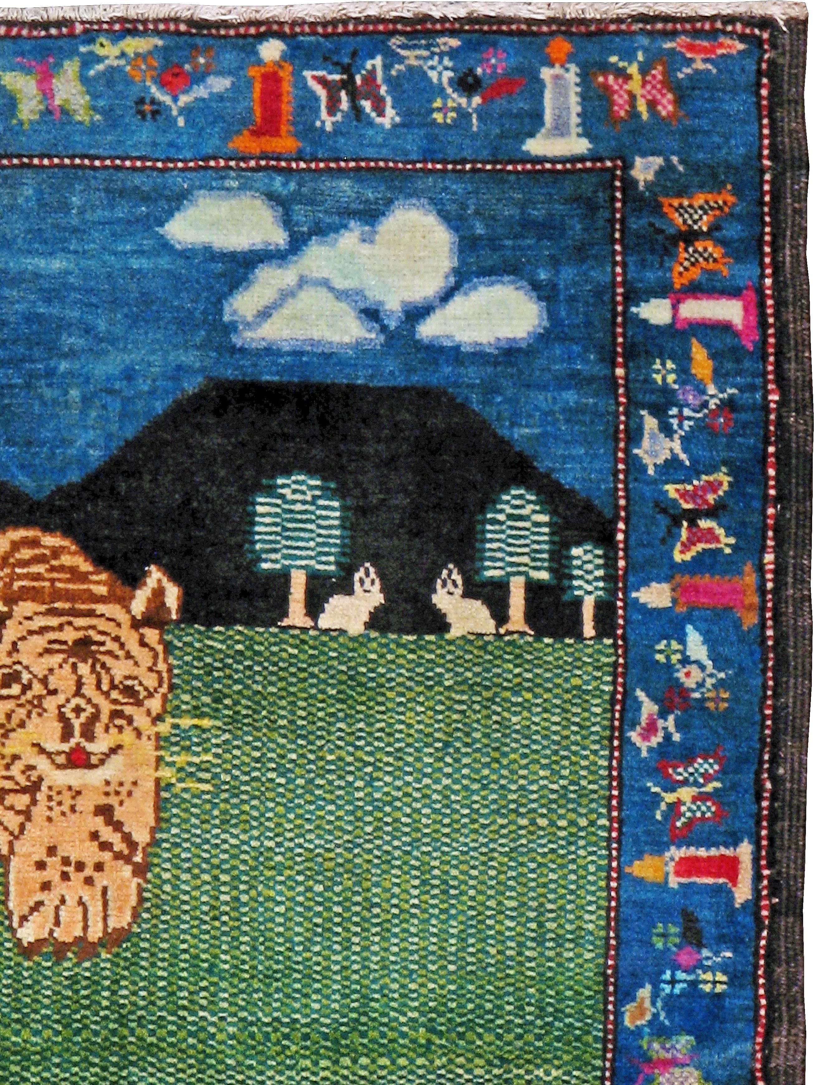 An antique Persian Malayer from the second quarter of the 20th century with a pictorial design of a tiger.