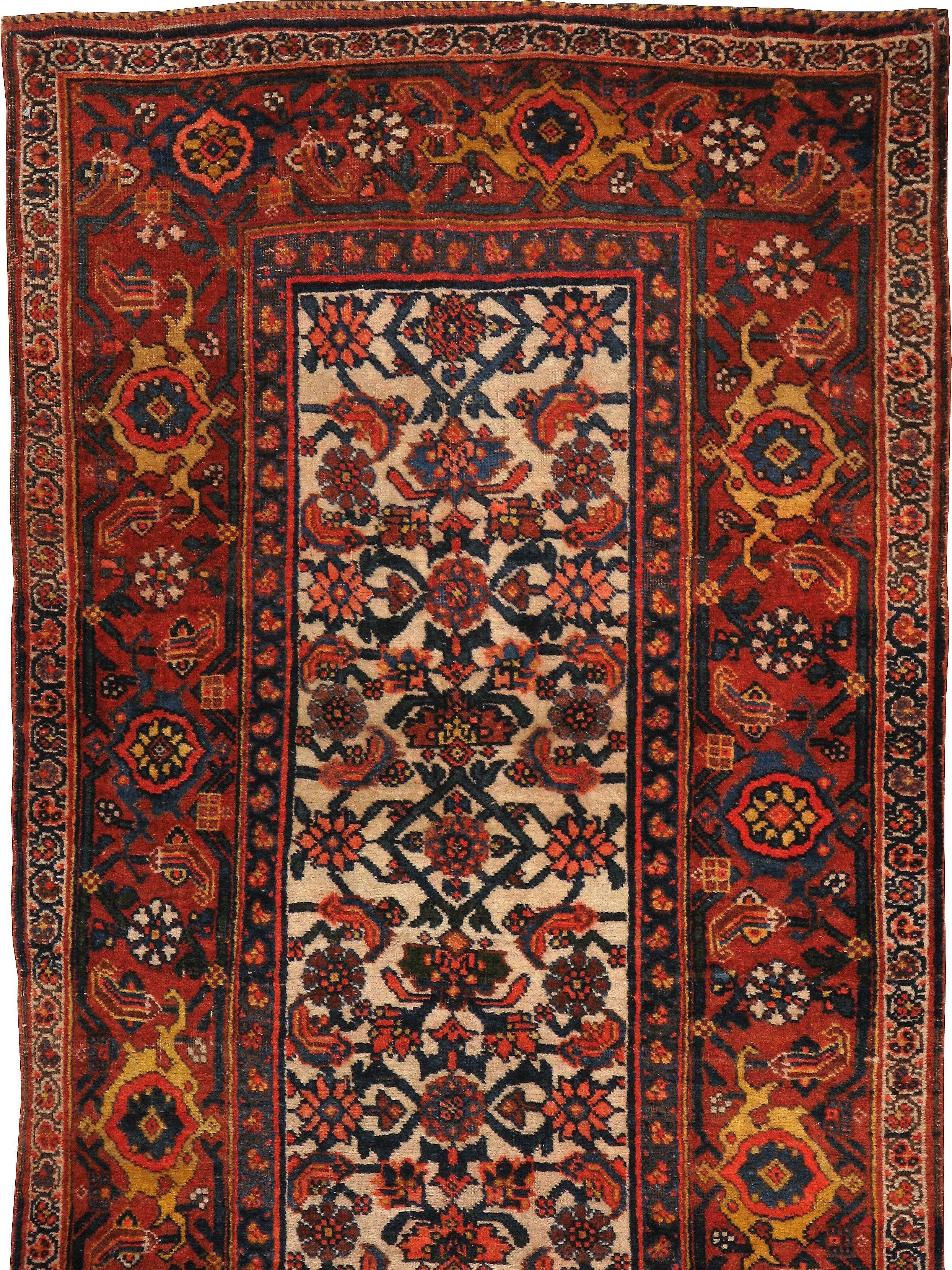 An antique Persian Bidjar rug from the turn of the 20th century.