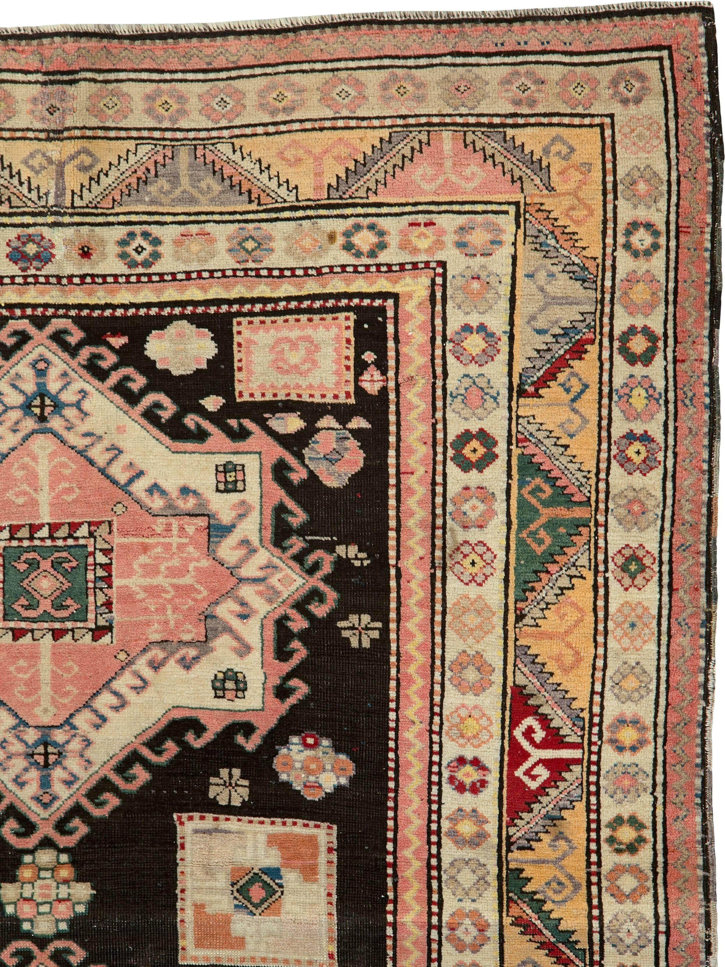 An antique Russian Karabagh carpet from the second quarter of the 20th century.