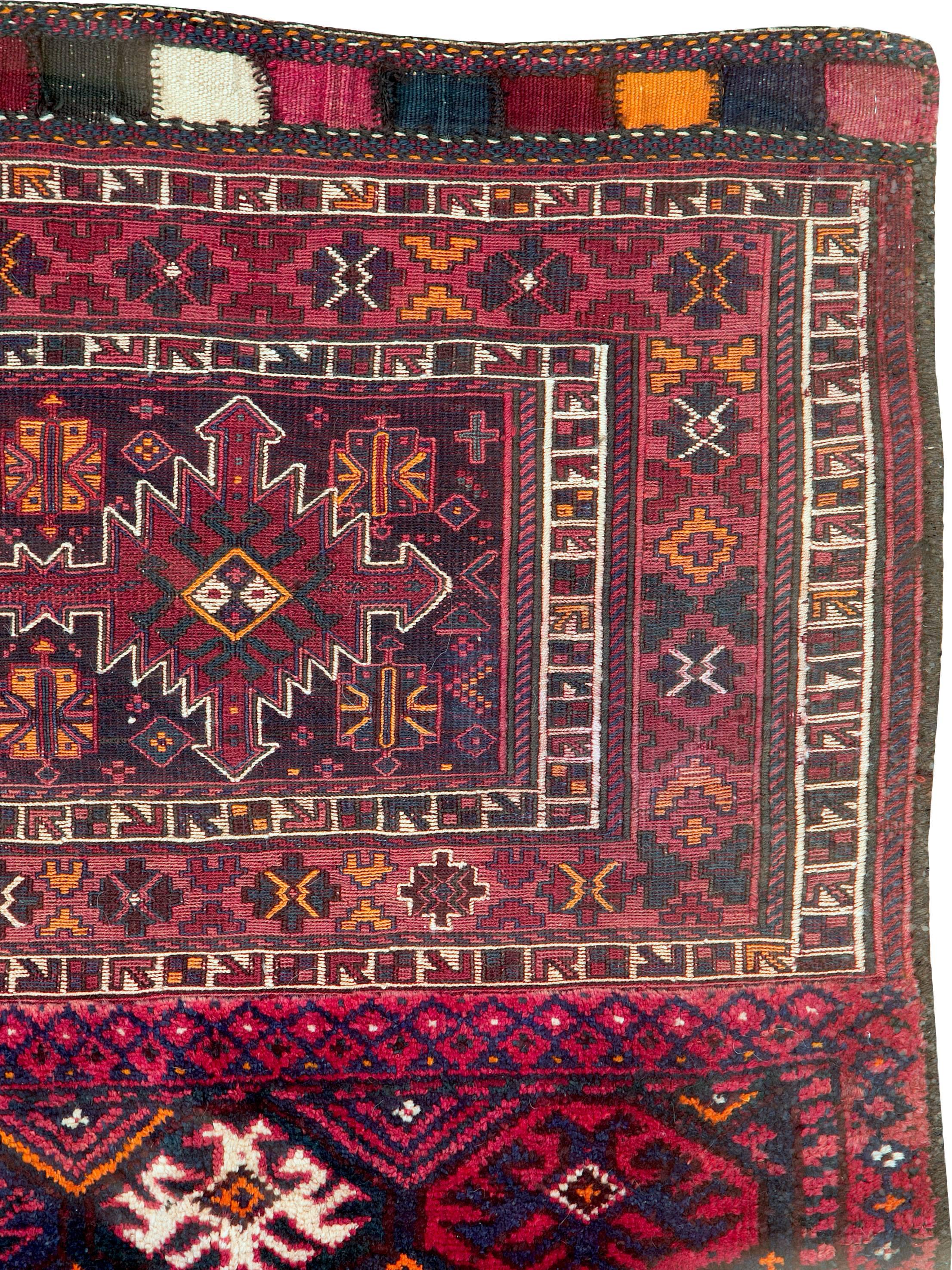 A vintage Uzbek Tribal carpet from the mid-20th century with both Soumak (flat-weave stitch) and pile.