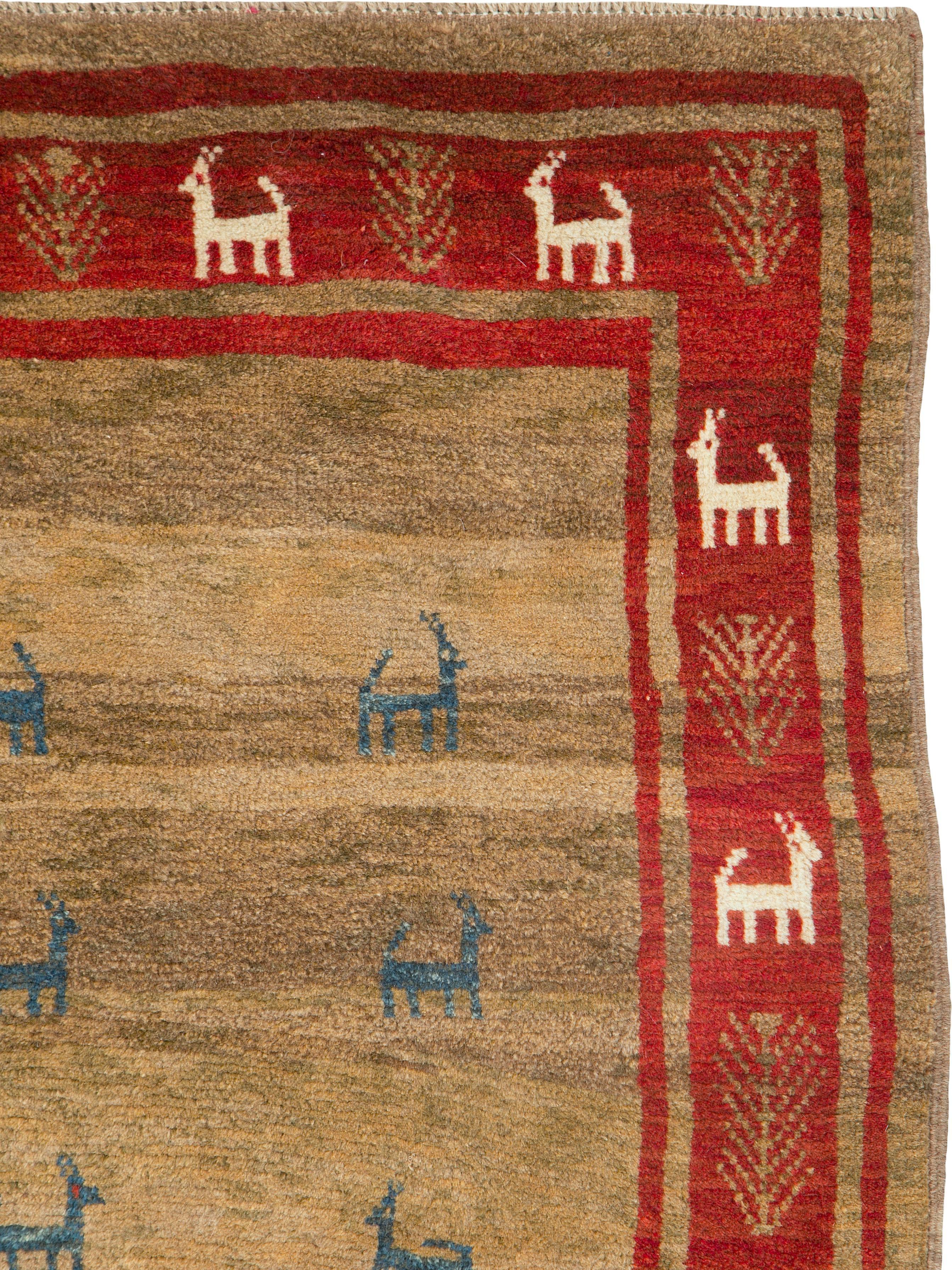 A vintage Persian Gabbeh carpet from the second half of the 20th century.